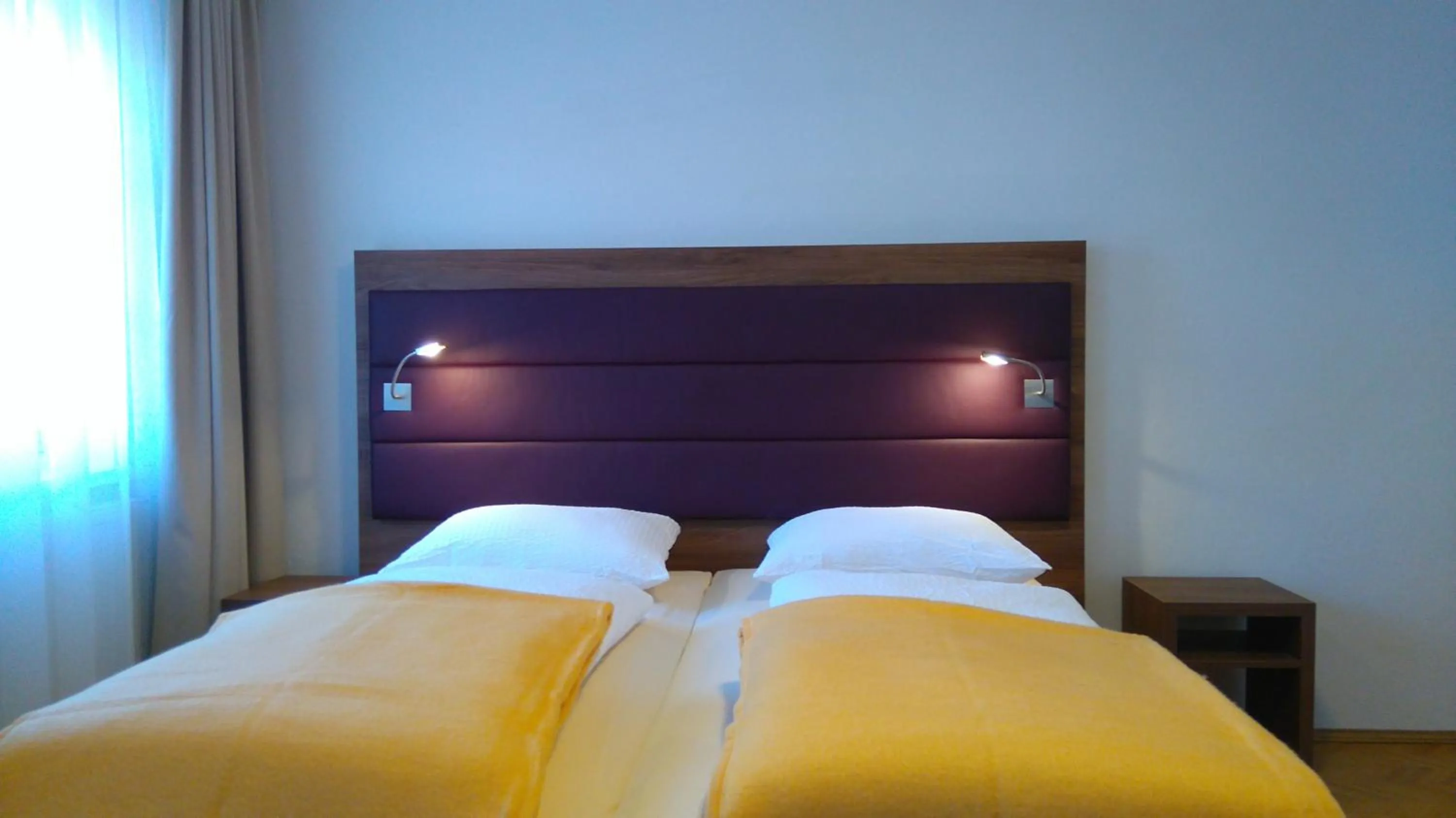 Bed in Pension Elisabeth - Rooms & Apartments