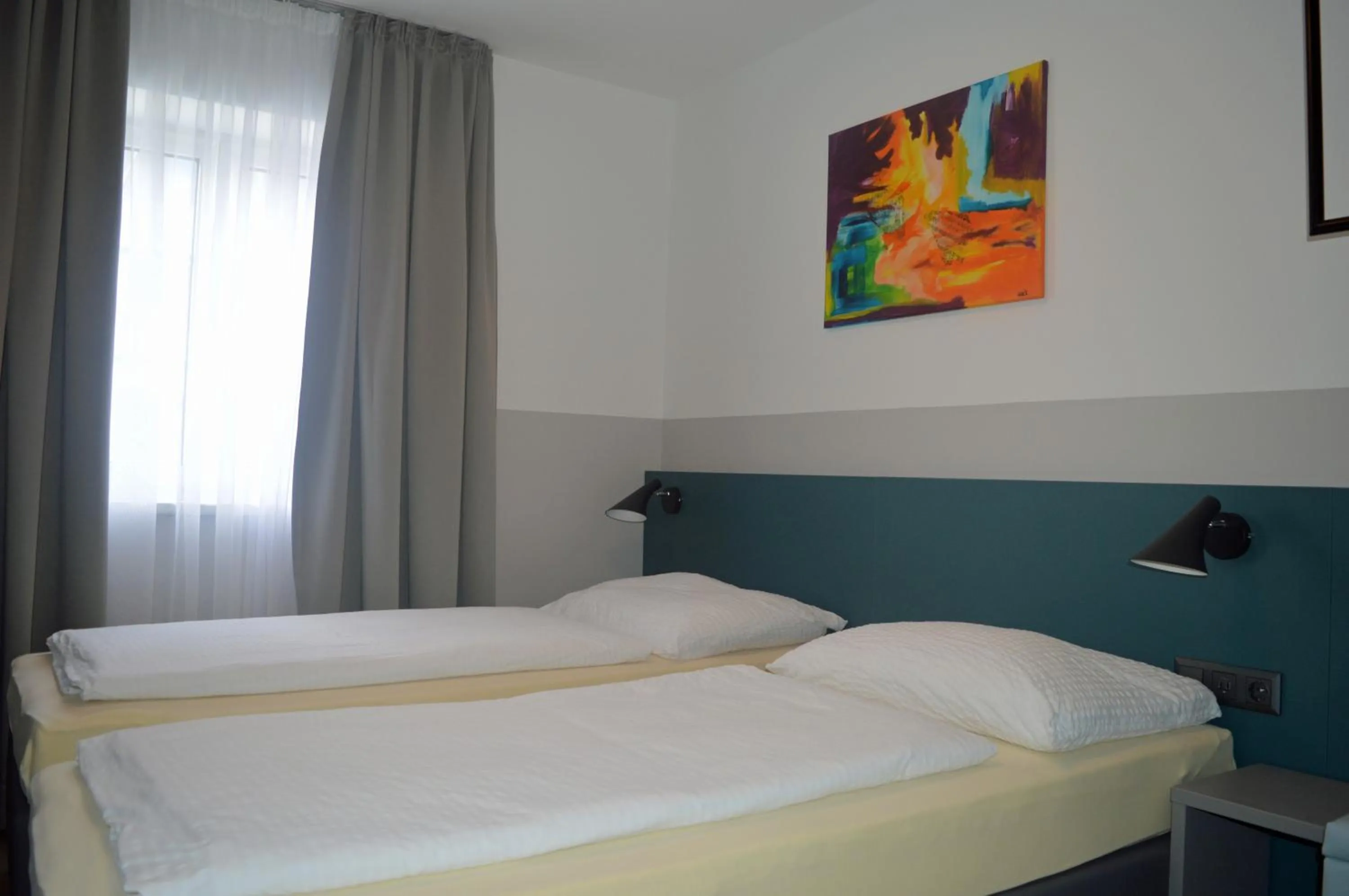 Bed in Pension Elisabeth - Rooms & Apartments