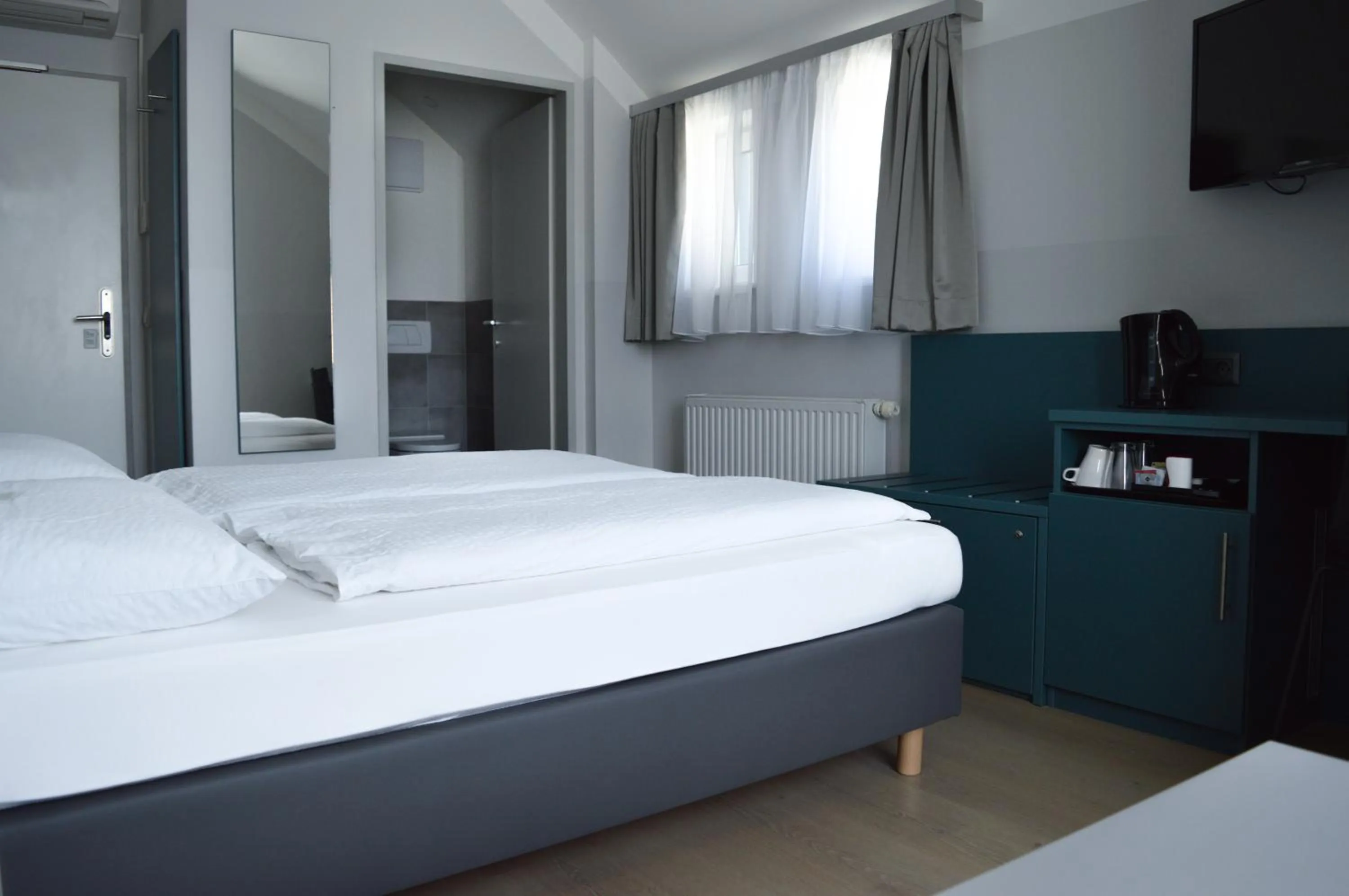 Bed in Pension Elisabeth - Rooms & Apartments