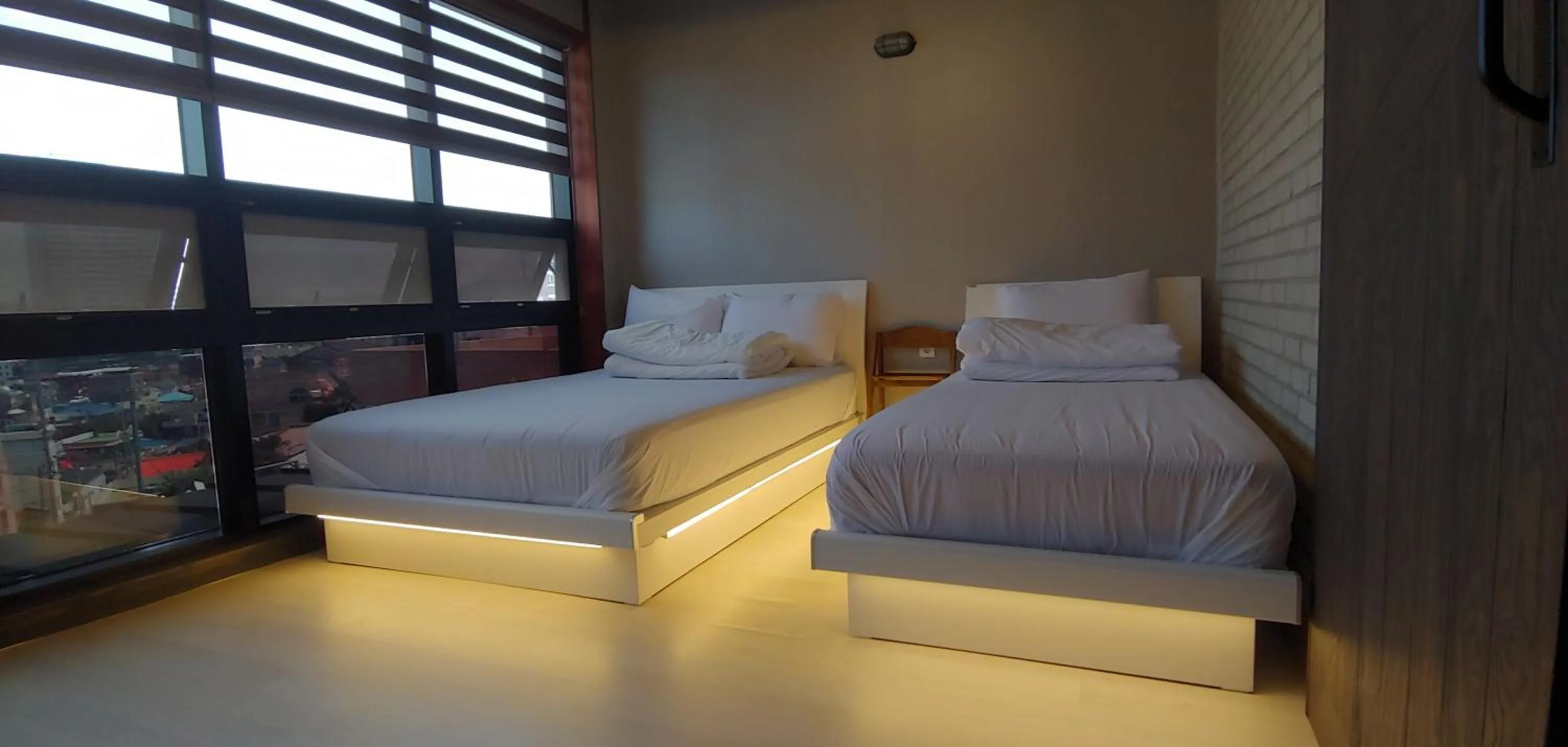 Bed in White Windmill Guesthouse