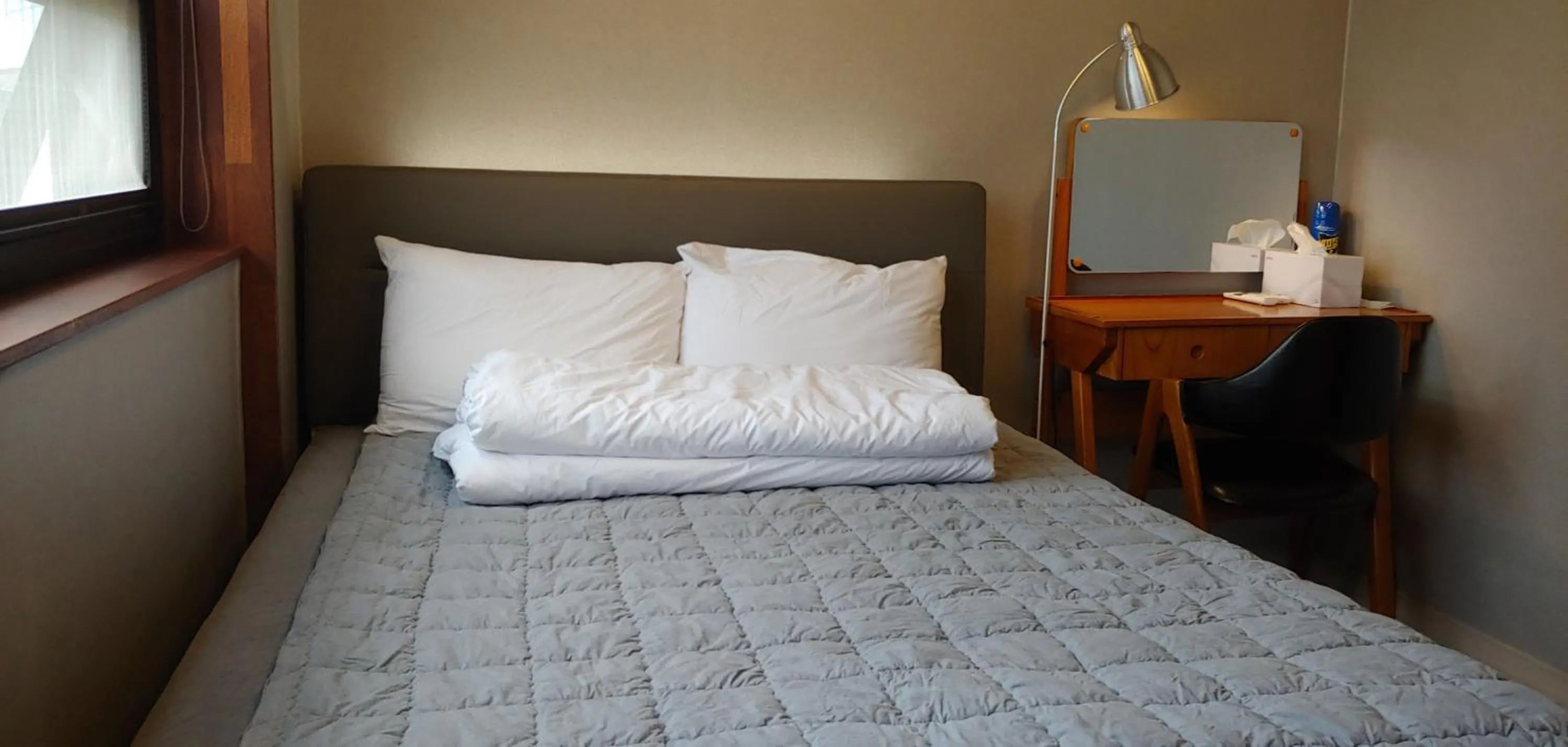 Bed in White Windmill Guesthouse