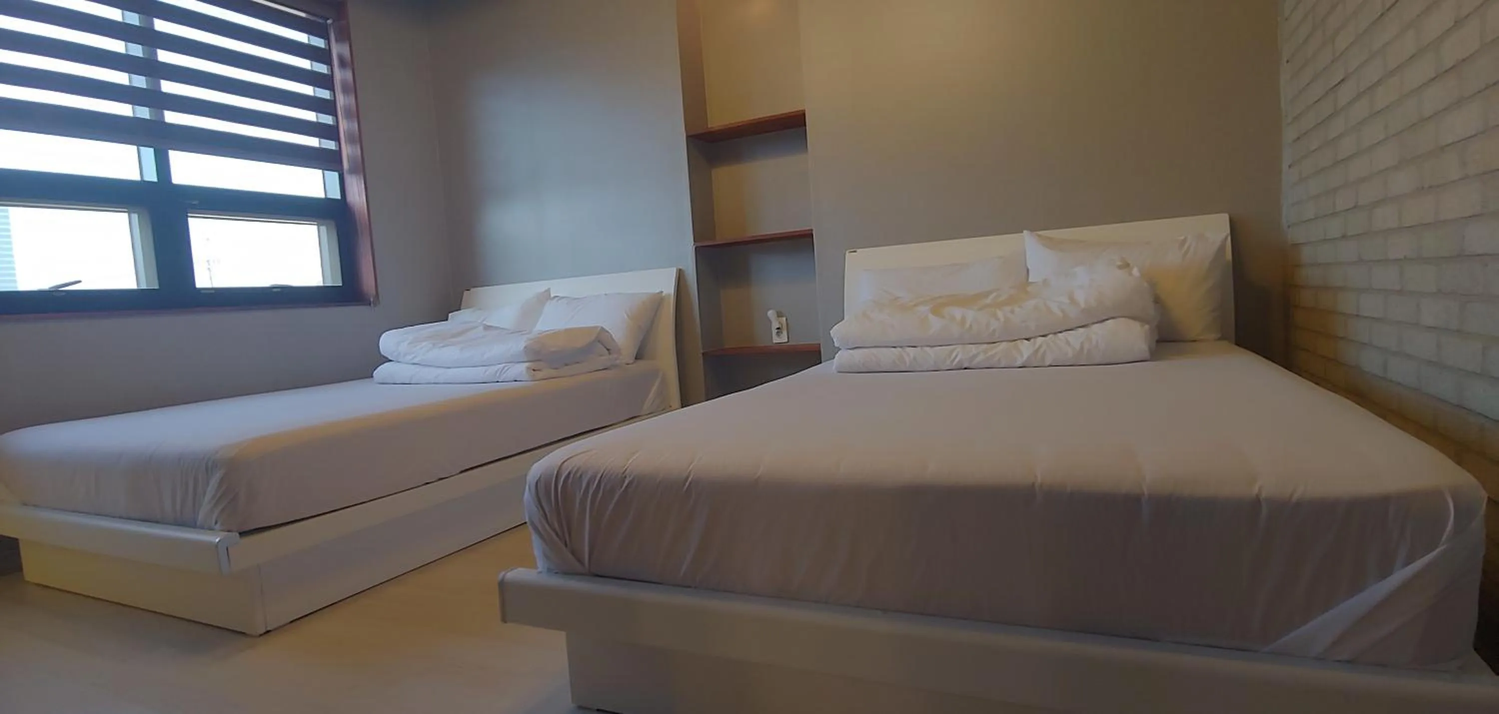 Bed in White Windmill Guesthouse