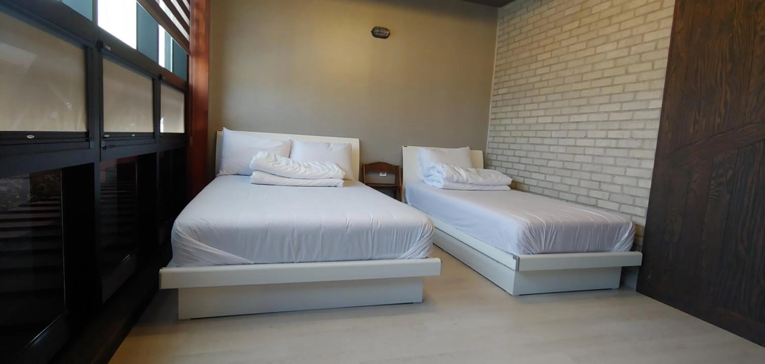 Bed in White Windmill Guesthouse