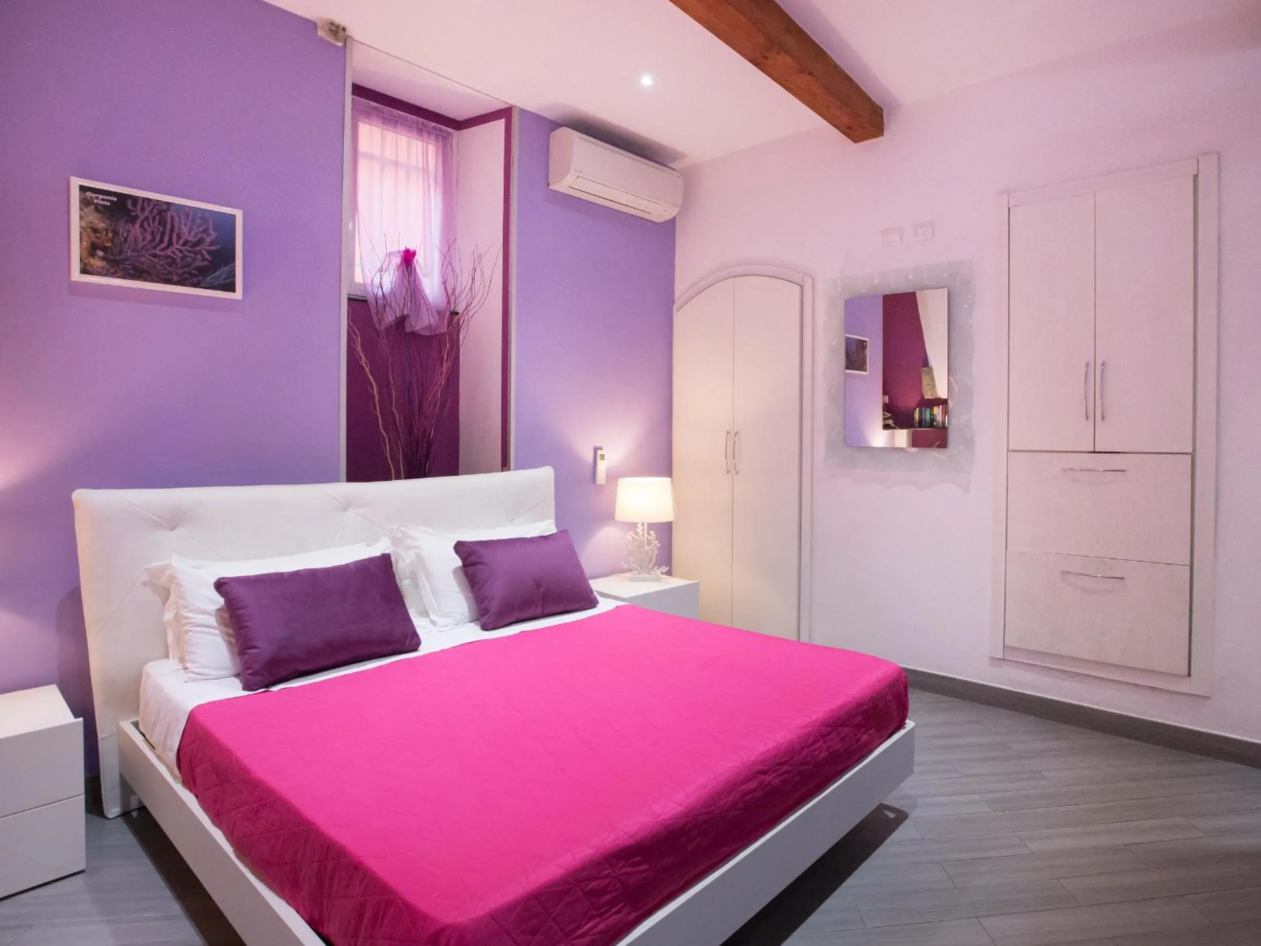 Bed in I Coralli rooms & apartments