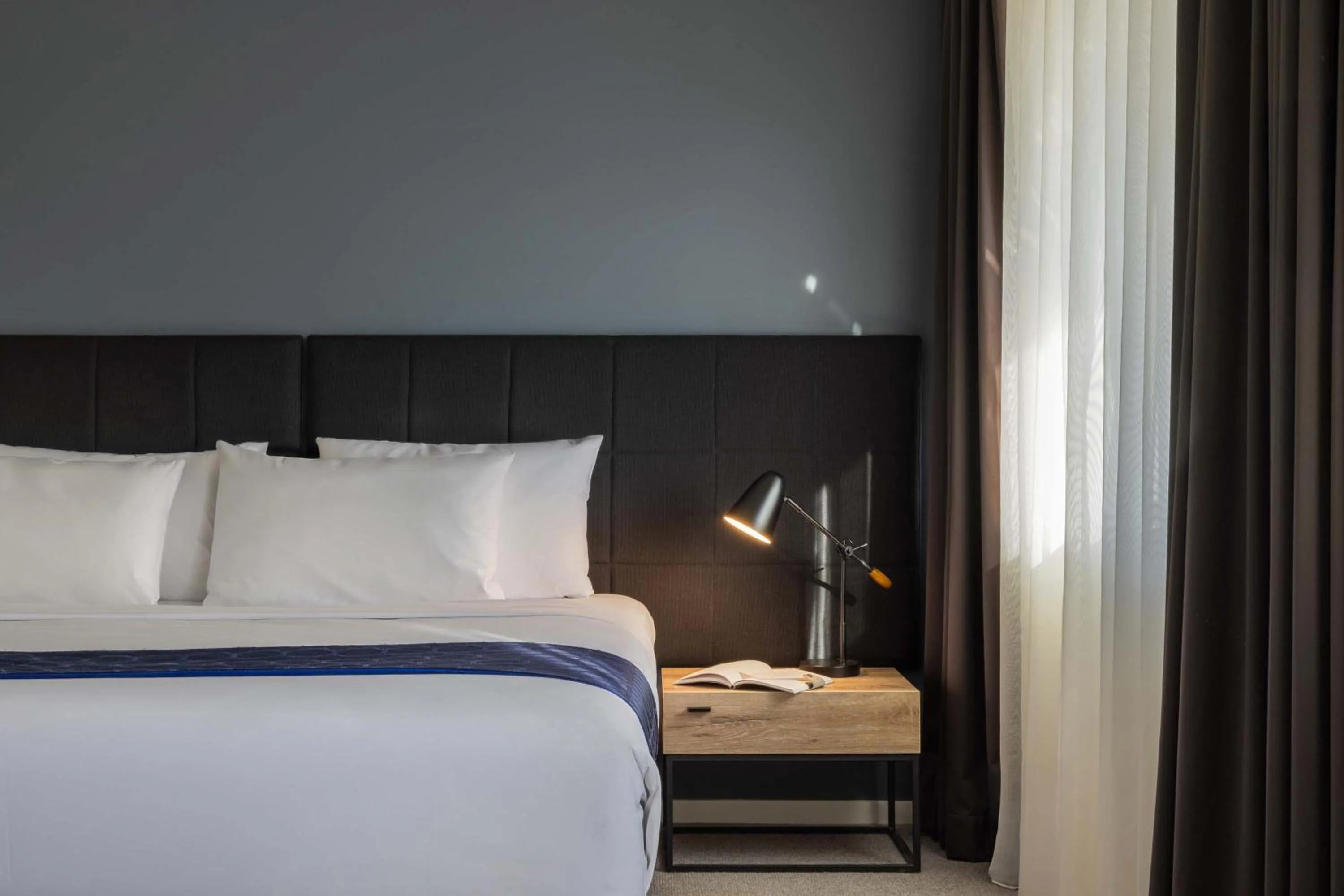 Bed in Mantra MacArthur Hotel