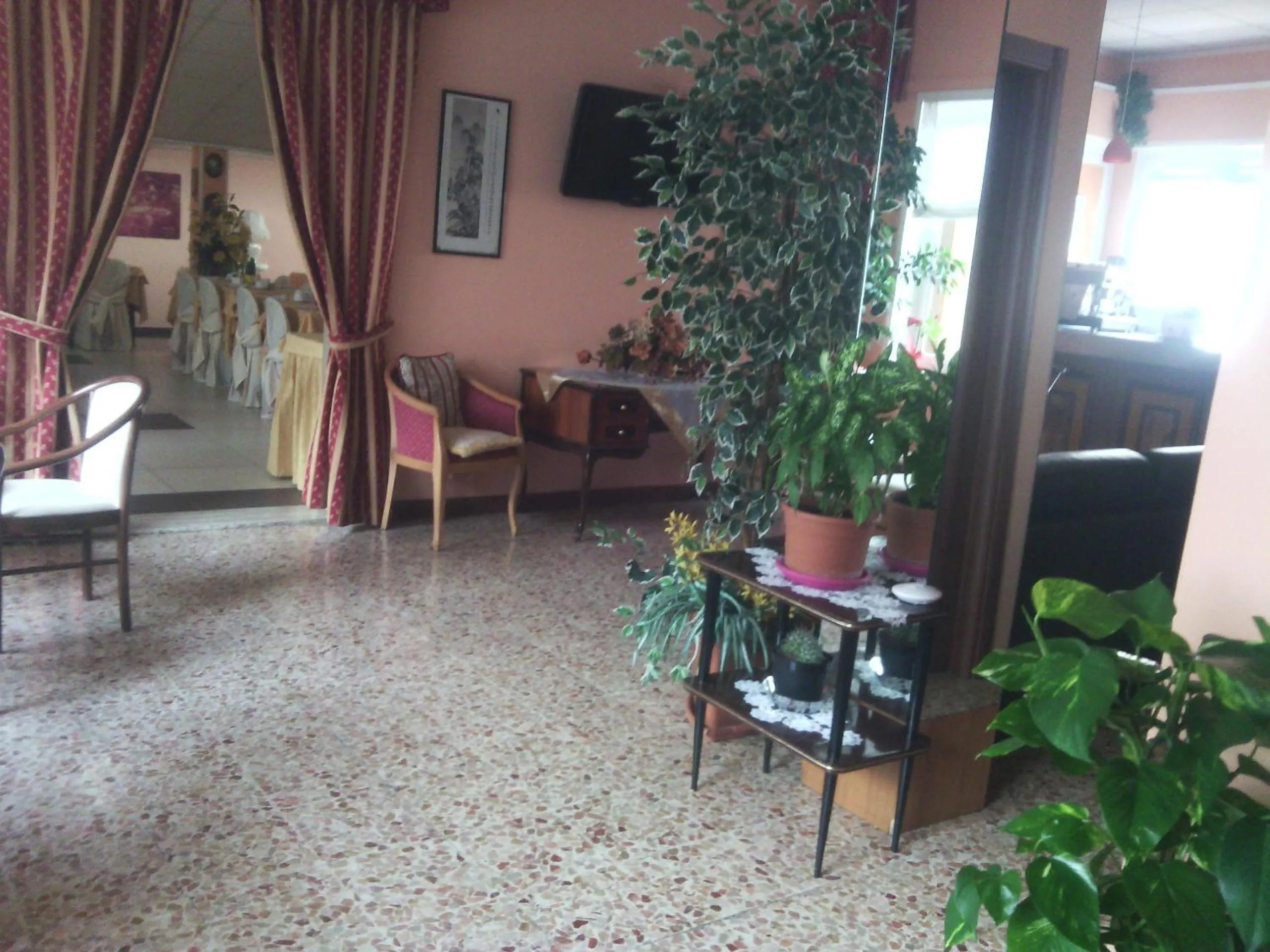 Communal lounge/ TV room in Hotel Corso