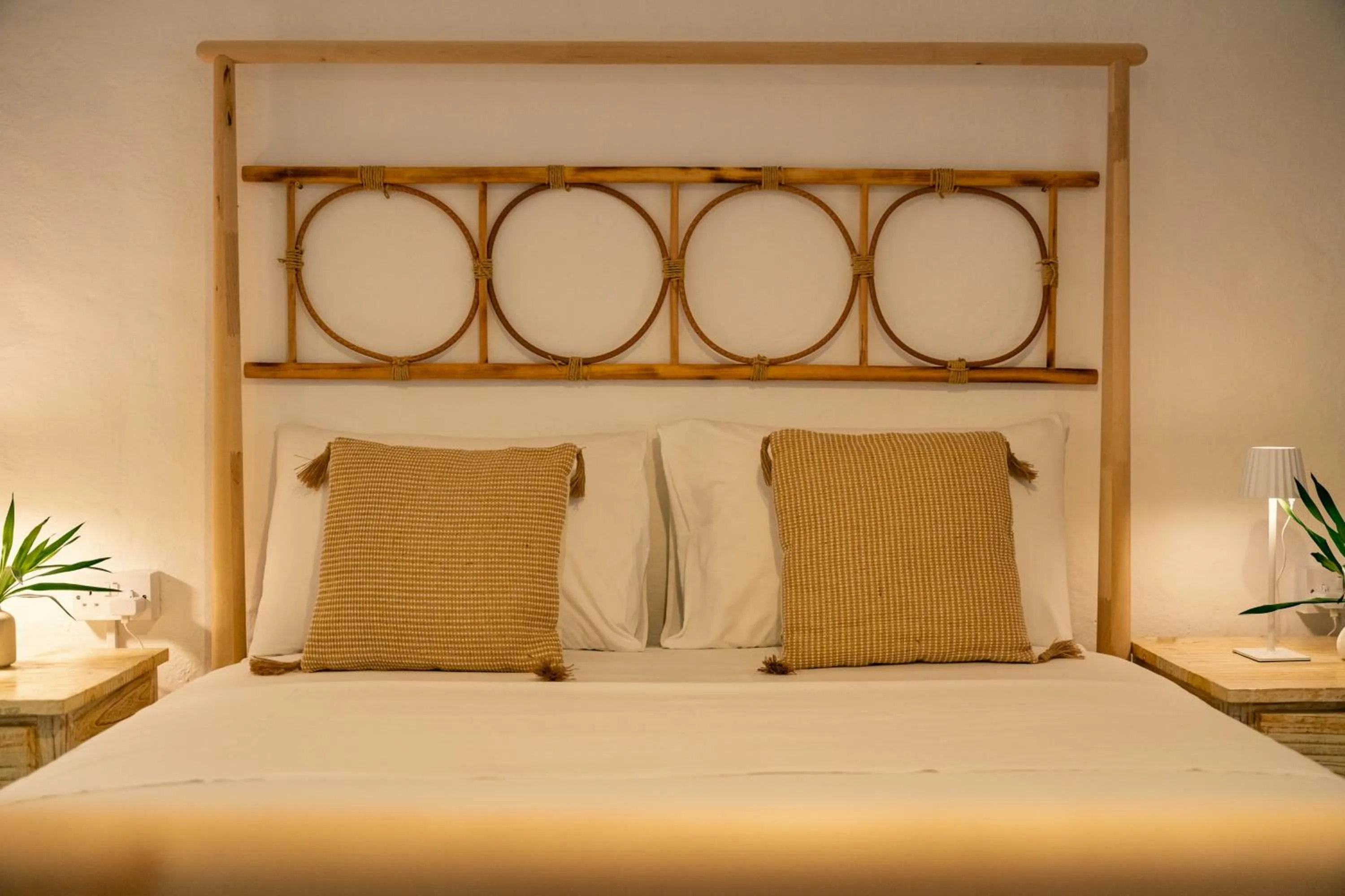 Bed in Beau Vallon Bungalows