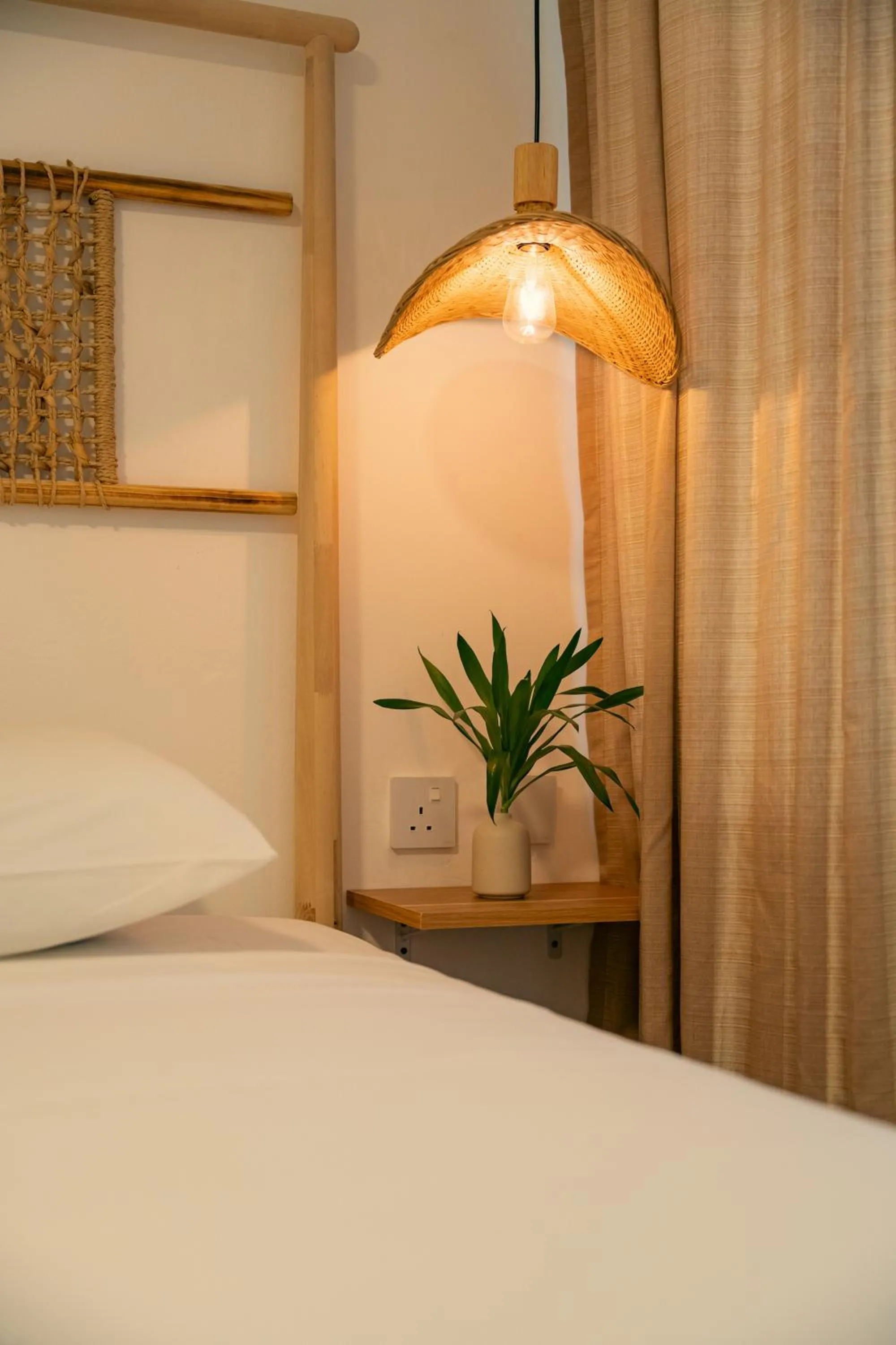 Bed in Beau Vallon Bungalows