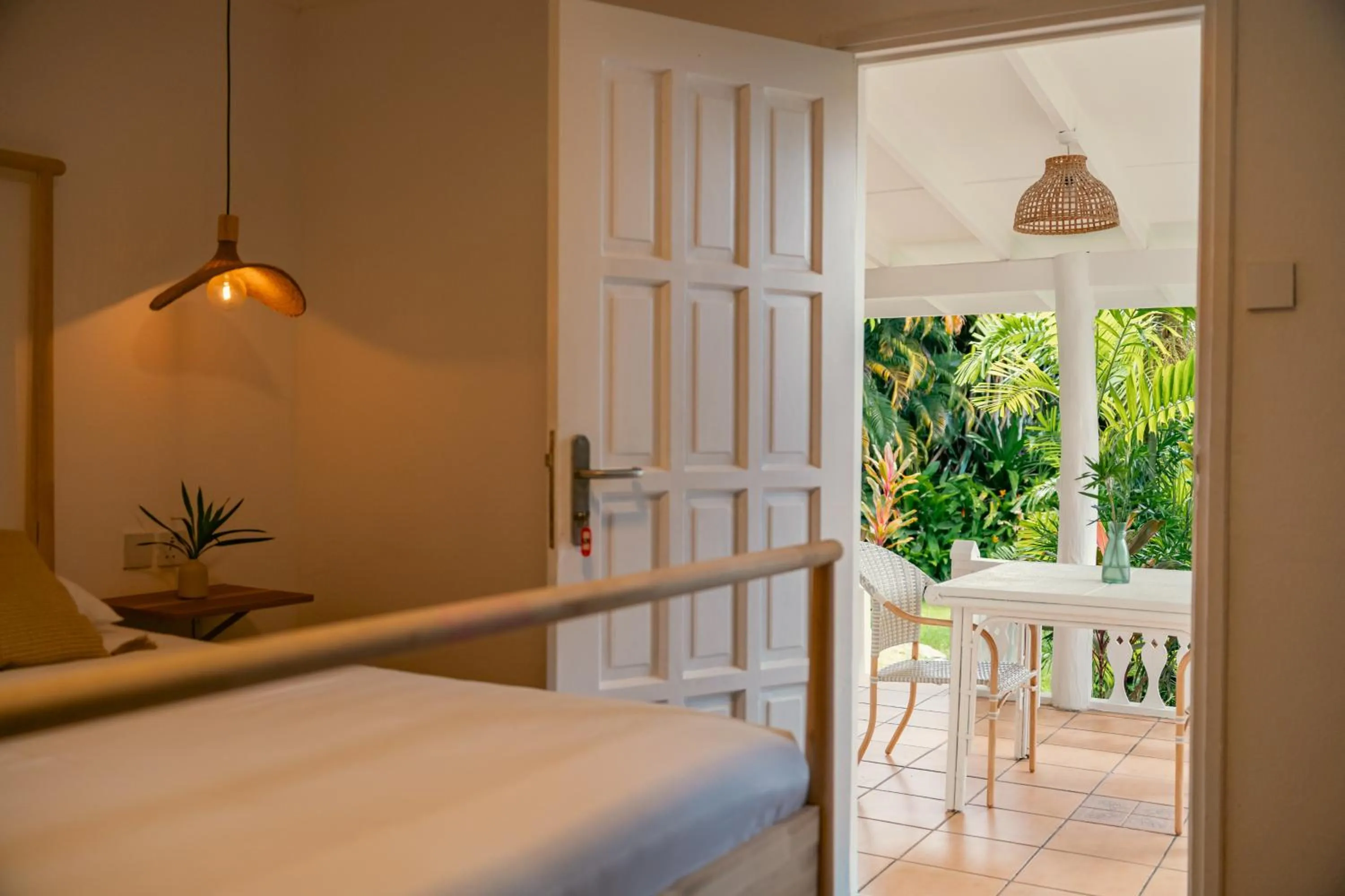 Bed in Beau Vallon Bungalows