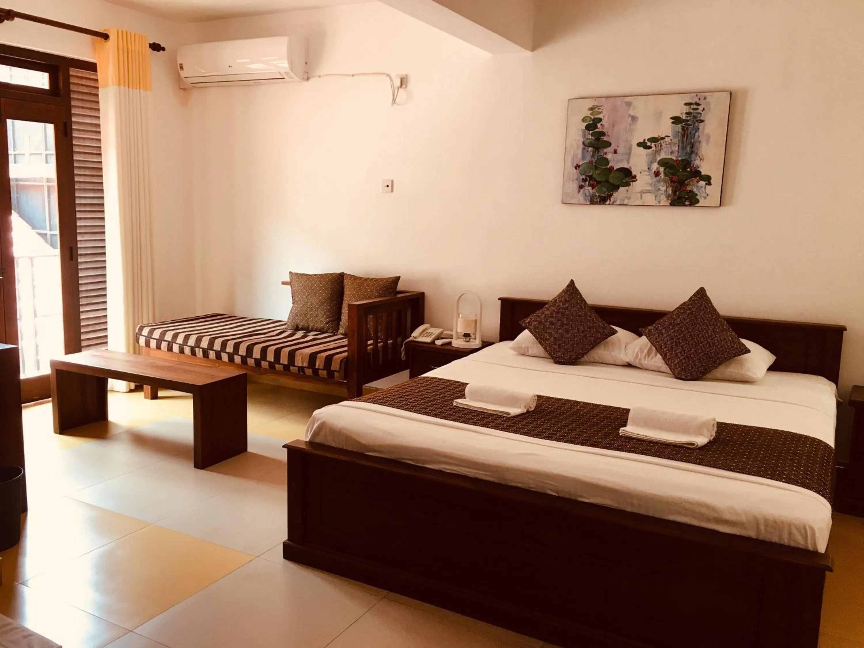 Bed in Sarvodaya Samma Vaasa Residence