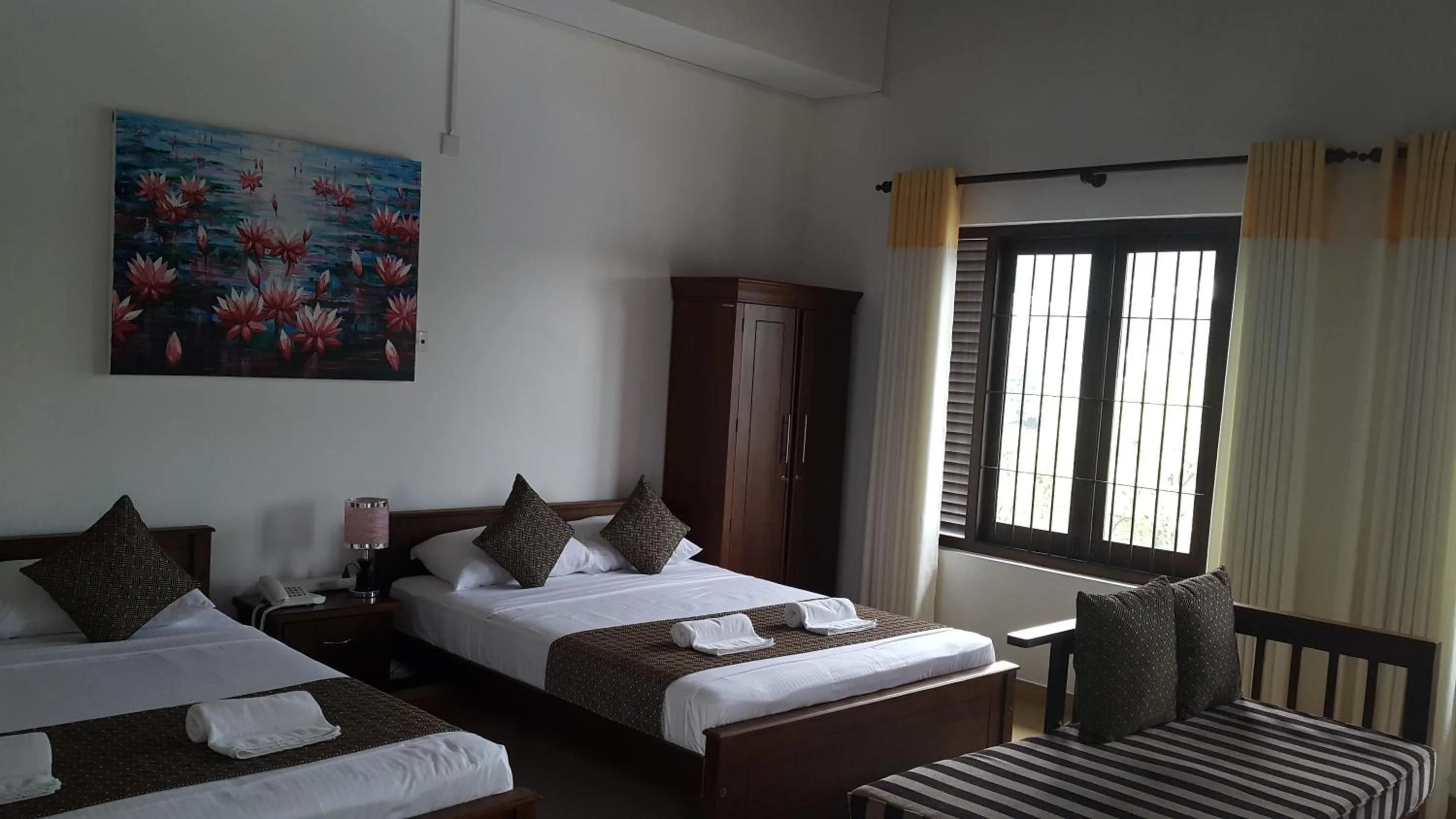 Bed in Sarvodaya Samma Vaasa Residence