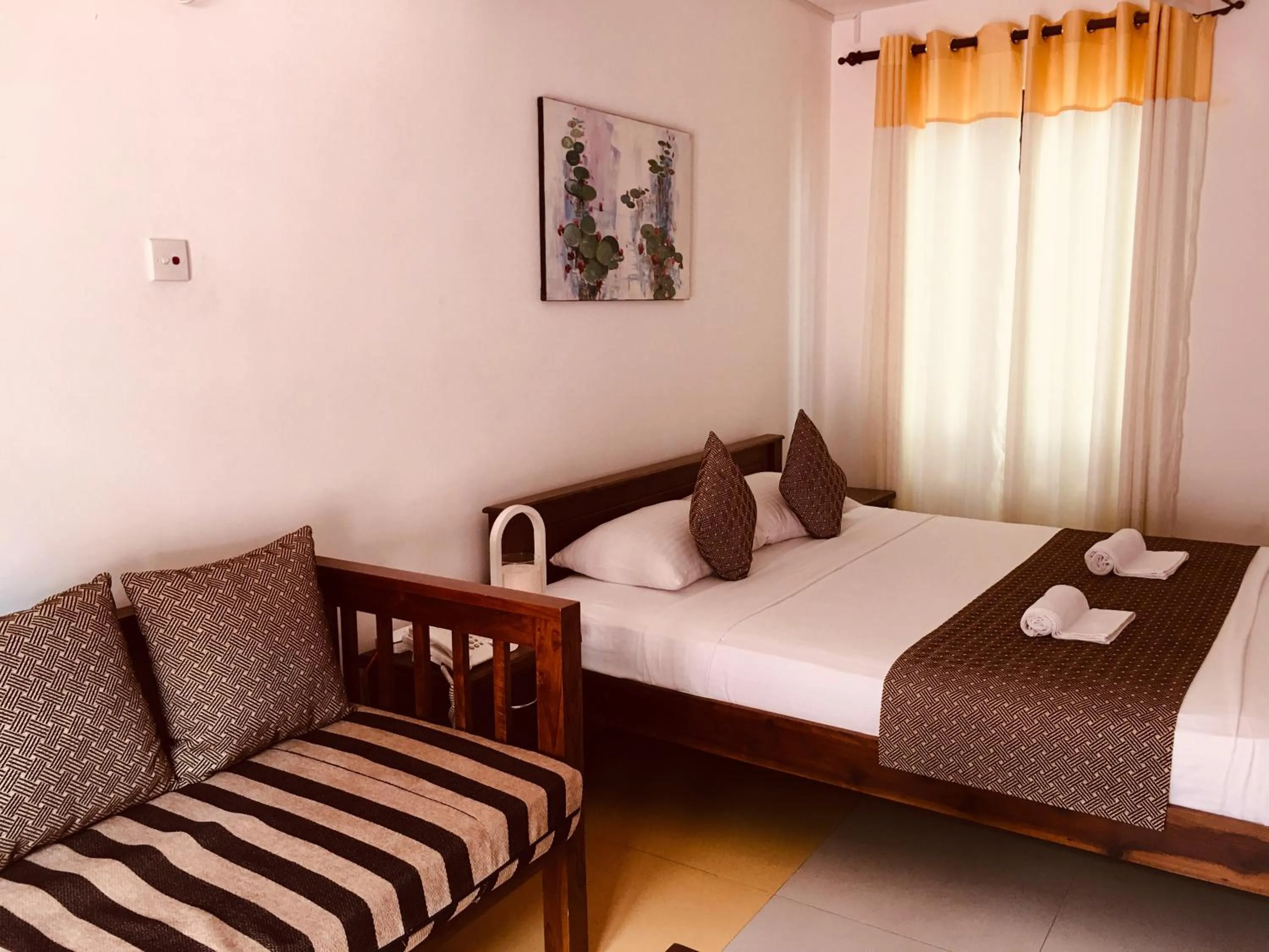 Bed in Sarvodaya Samma Vaasa Residence