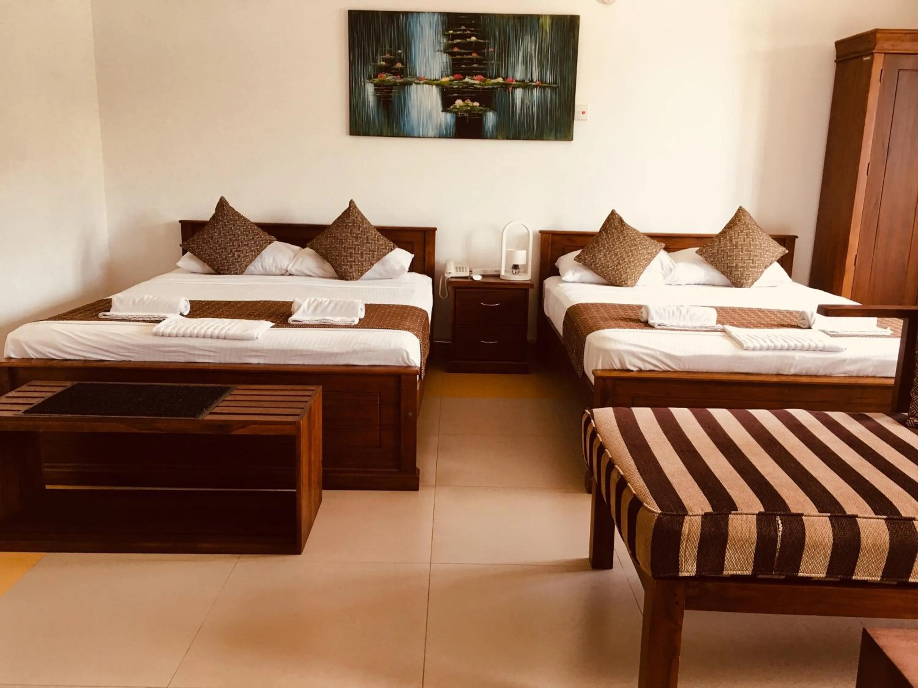 Bed in Sarvodaya Samma Vaasa Residence