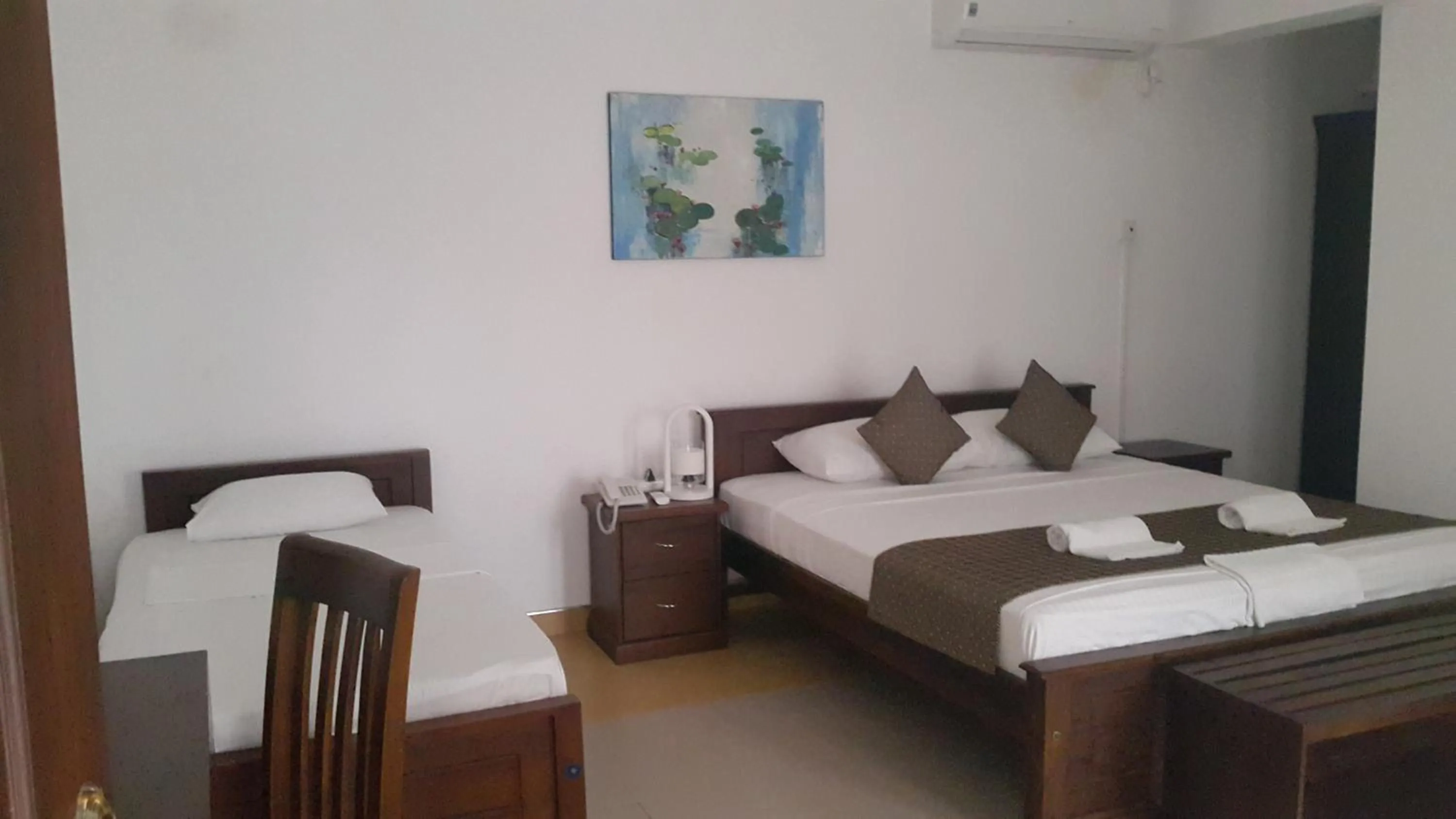 Bed in Sarvodaya Samma Vaasa Residence