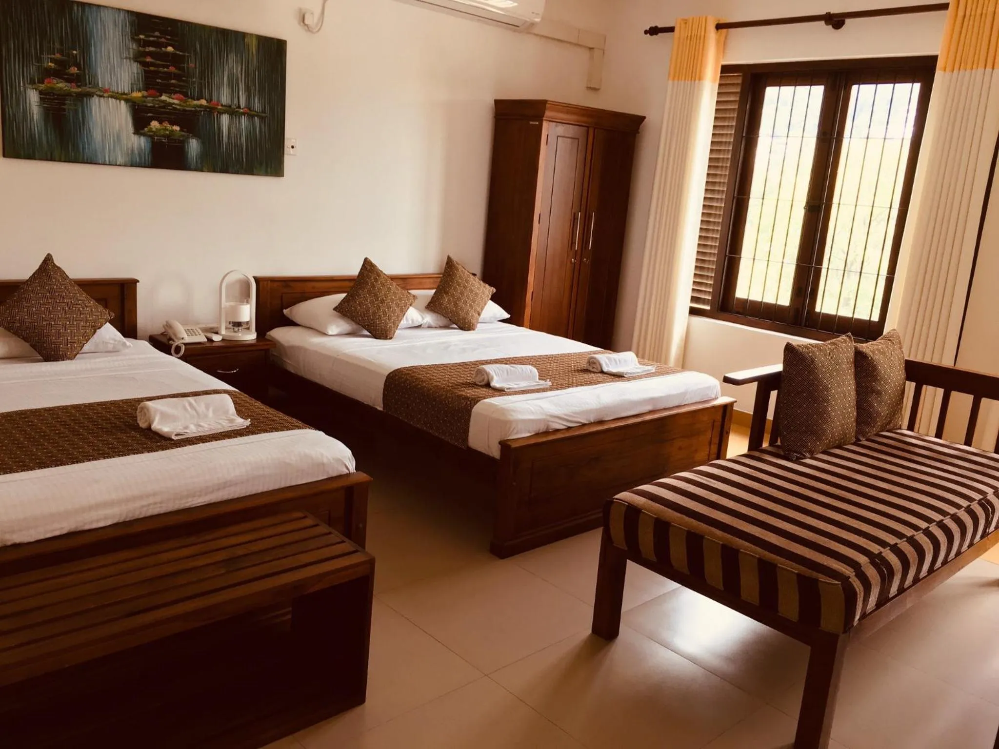 Bed in Sarvodaya Samma Vaasa Residence