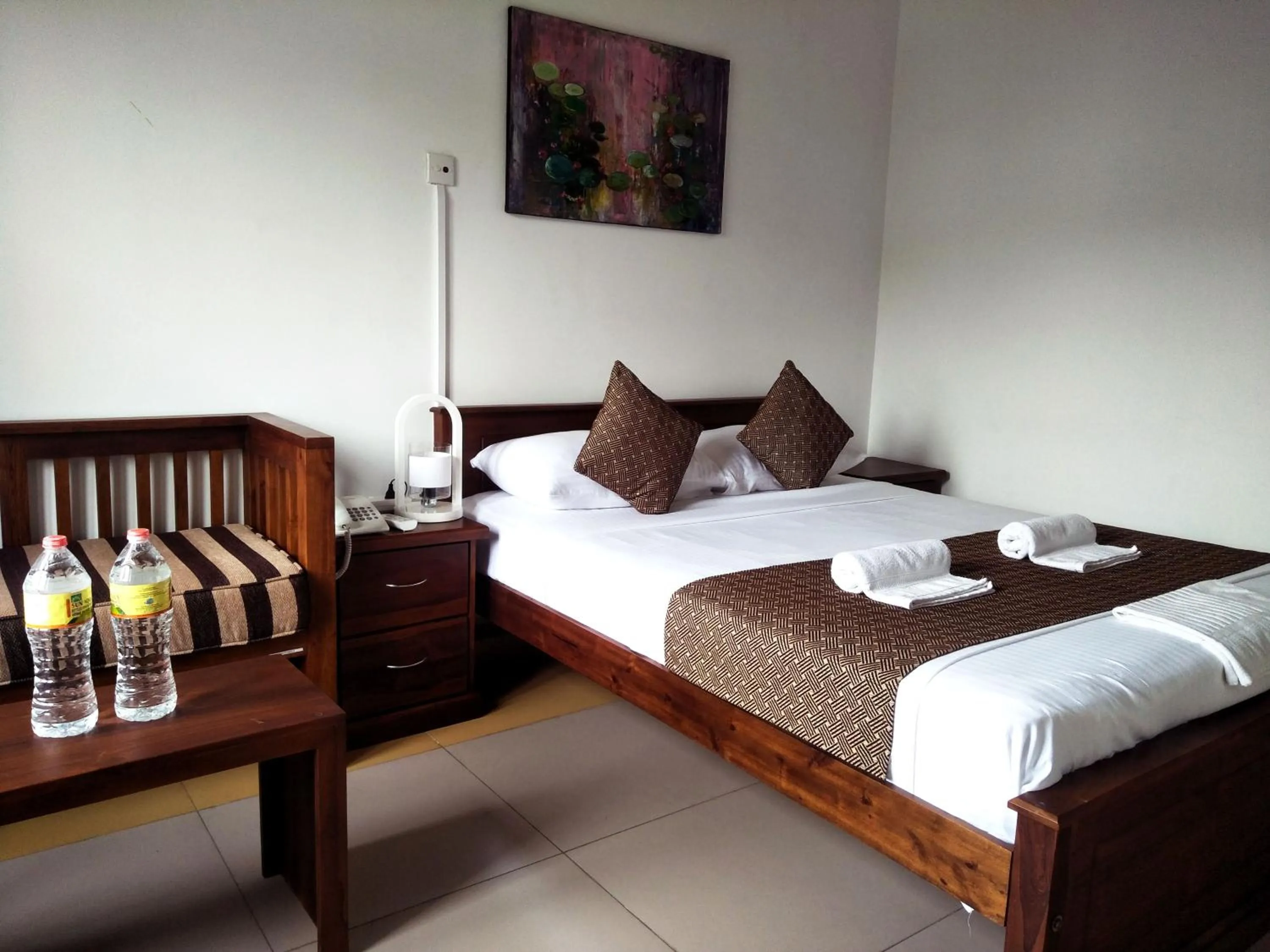 Bed in Sarvodaya Samma Vaasa Residence