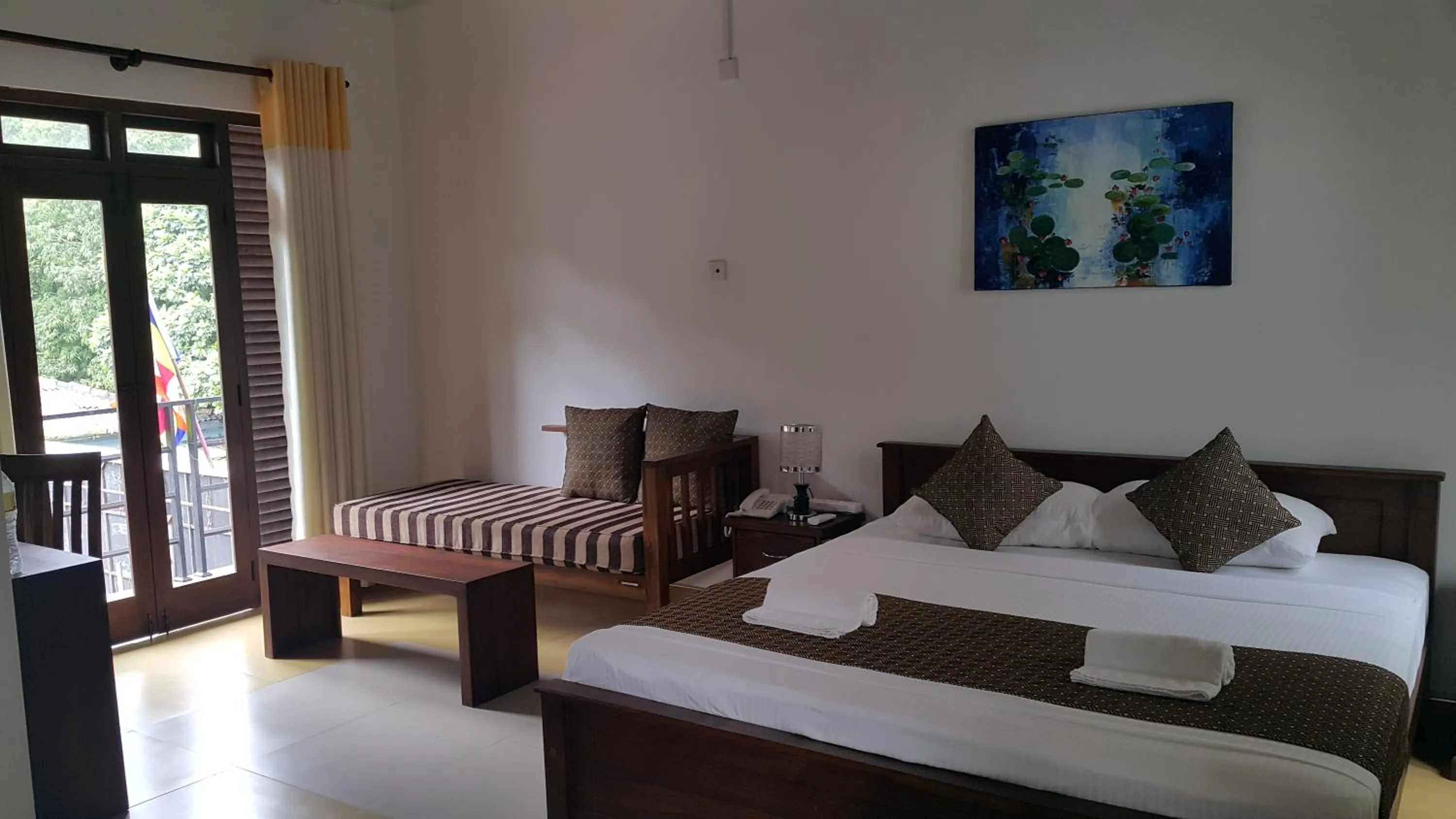 Bed in Sarvodaya Samma Vaasa Residence