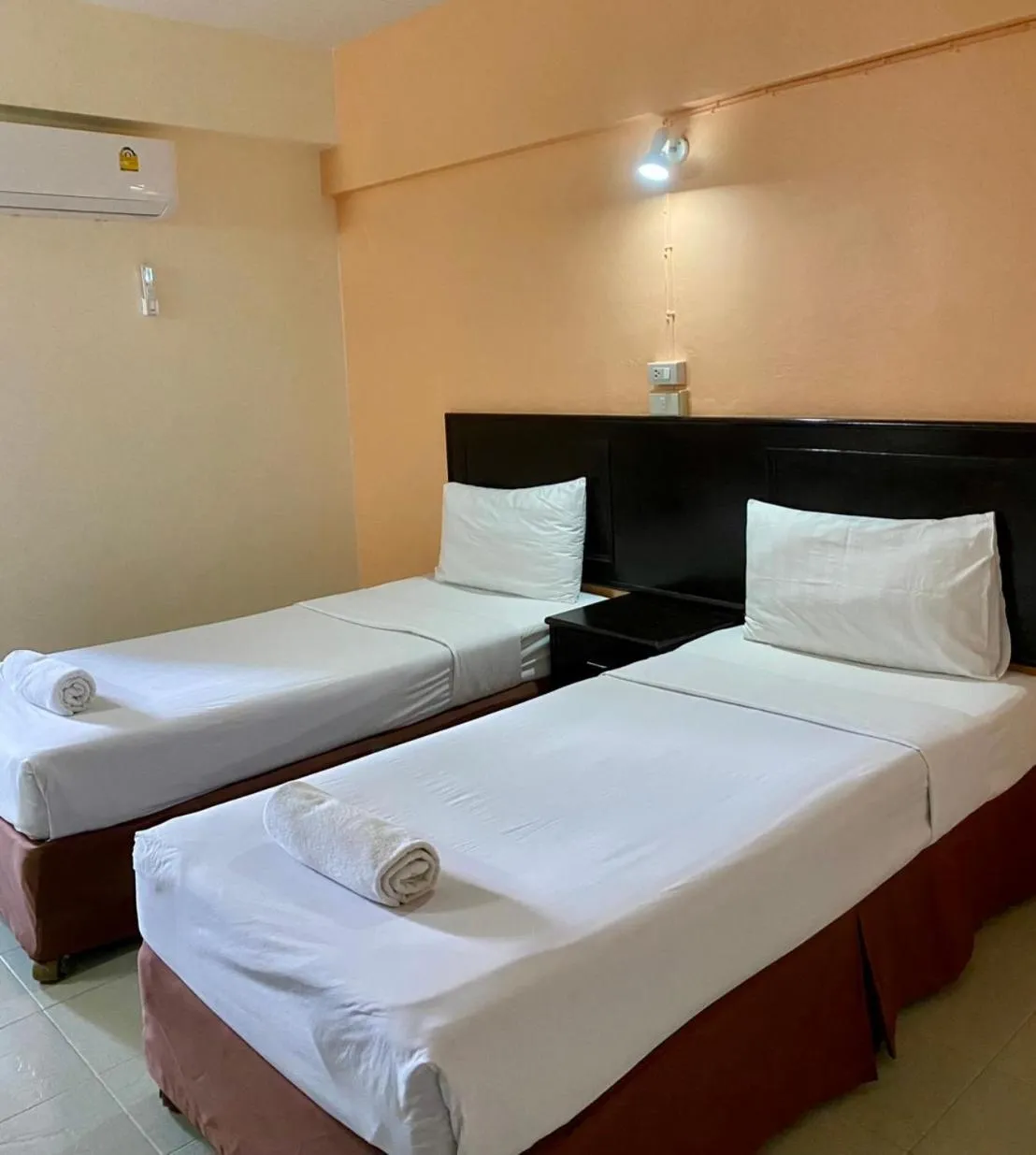 Bed in Centerpoint Hotel