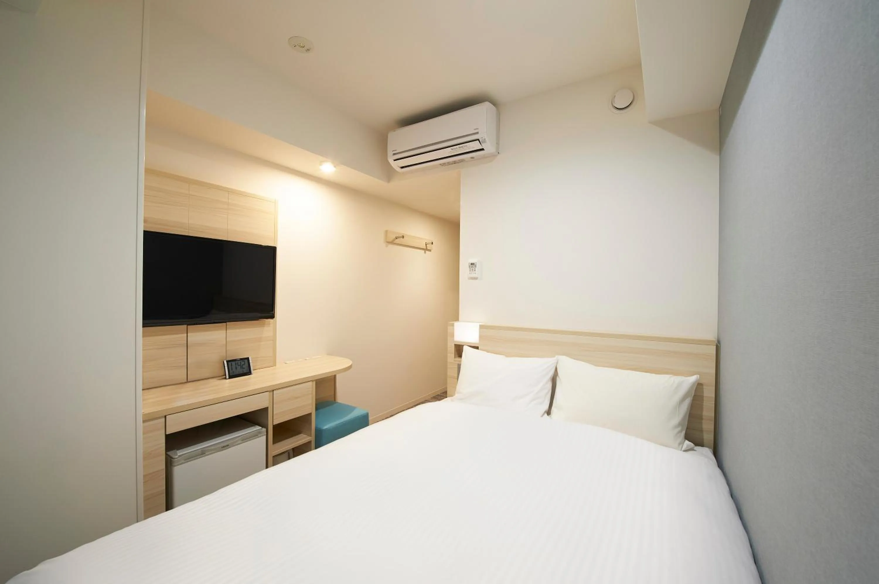 Bed in Sotetsu Fresa Inn Ueno-Okachimachi