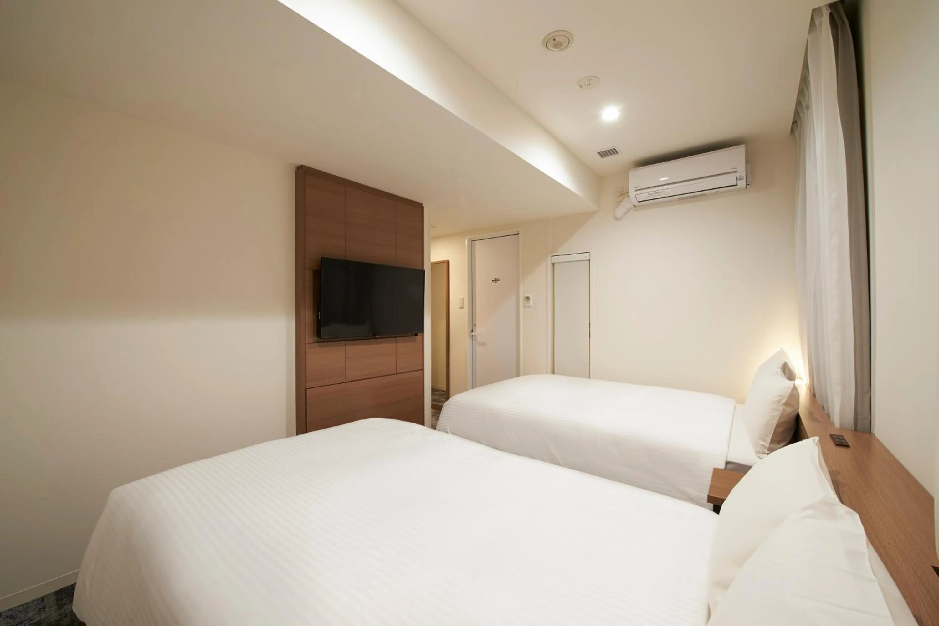 Bed in Sotetsu Fresa Inn Ueno-Okachimachi