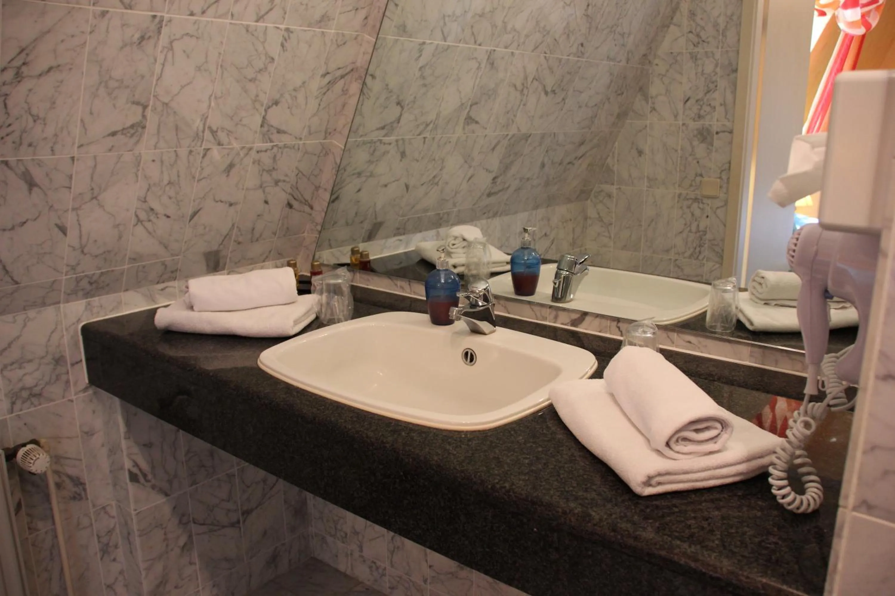 Bathroom in Hotel Nordic