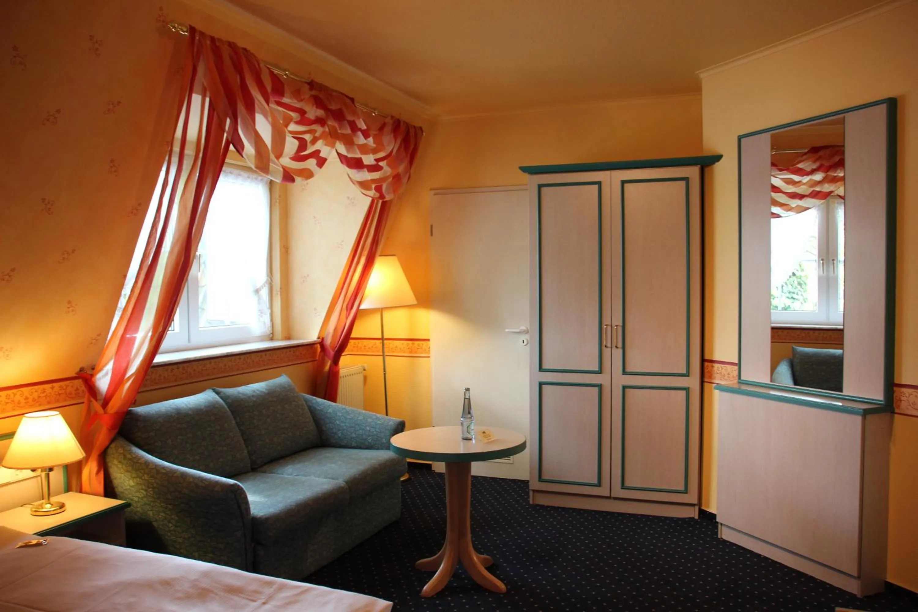 Seating area, Bed in Hotel Nordic