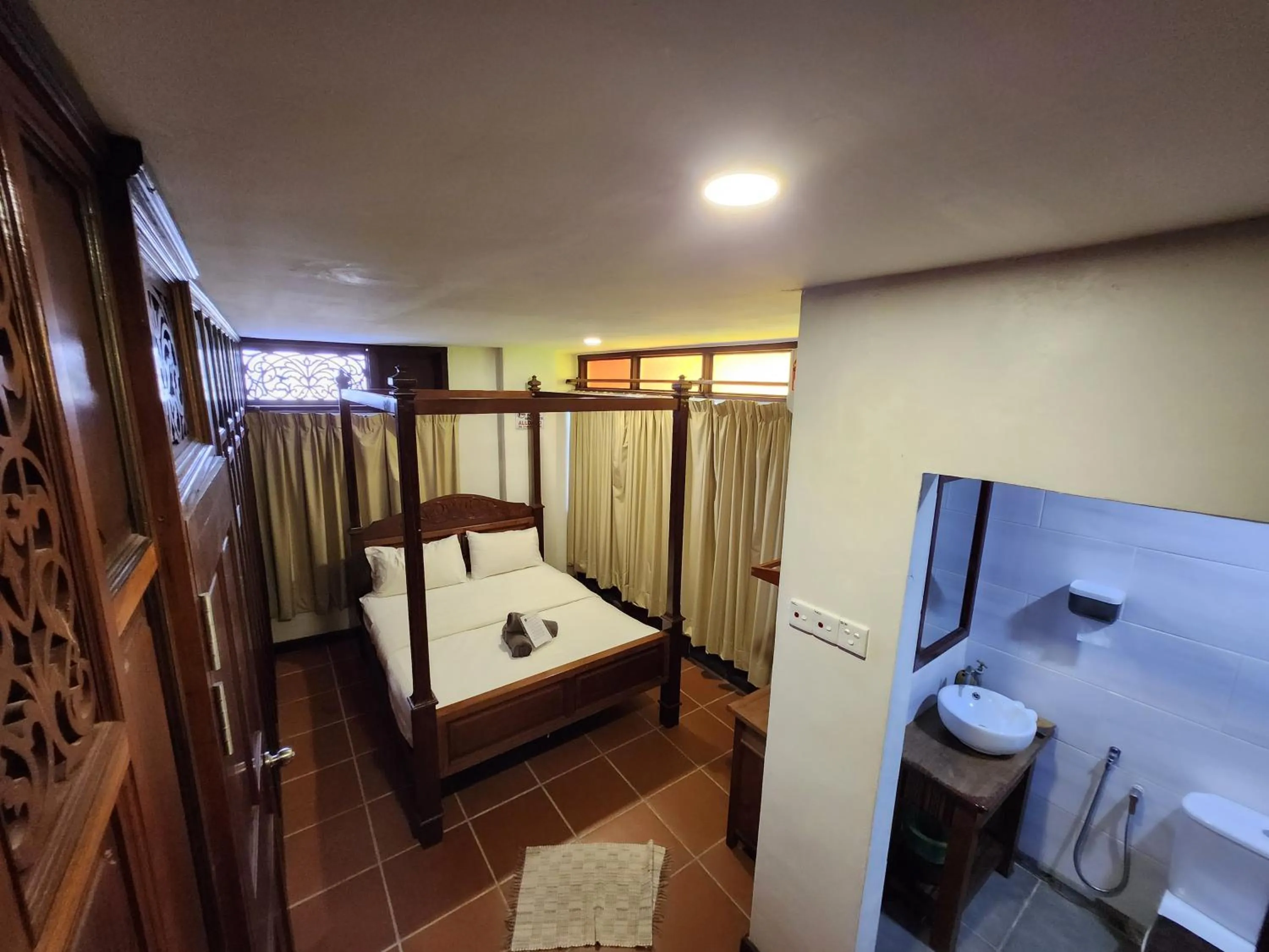 Bed in Uptown Eco Hotel