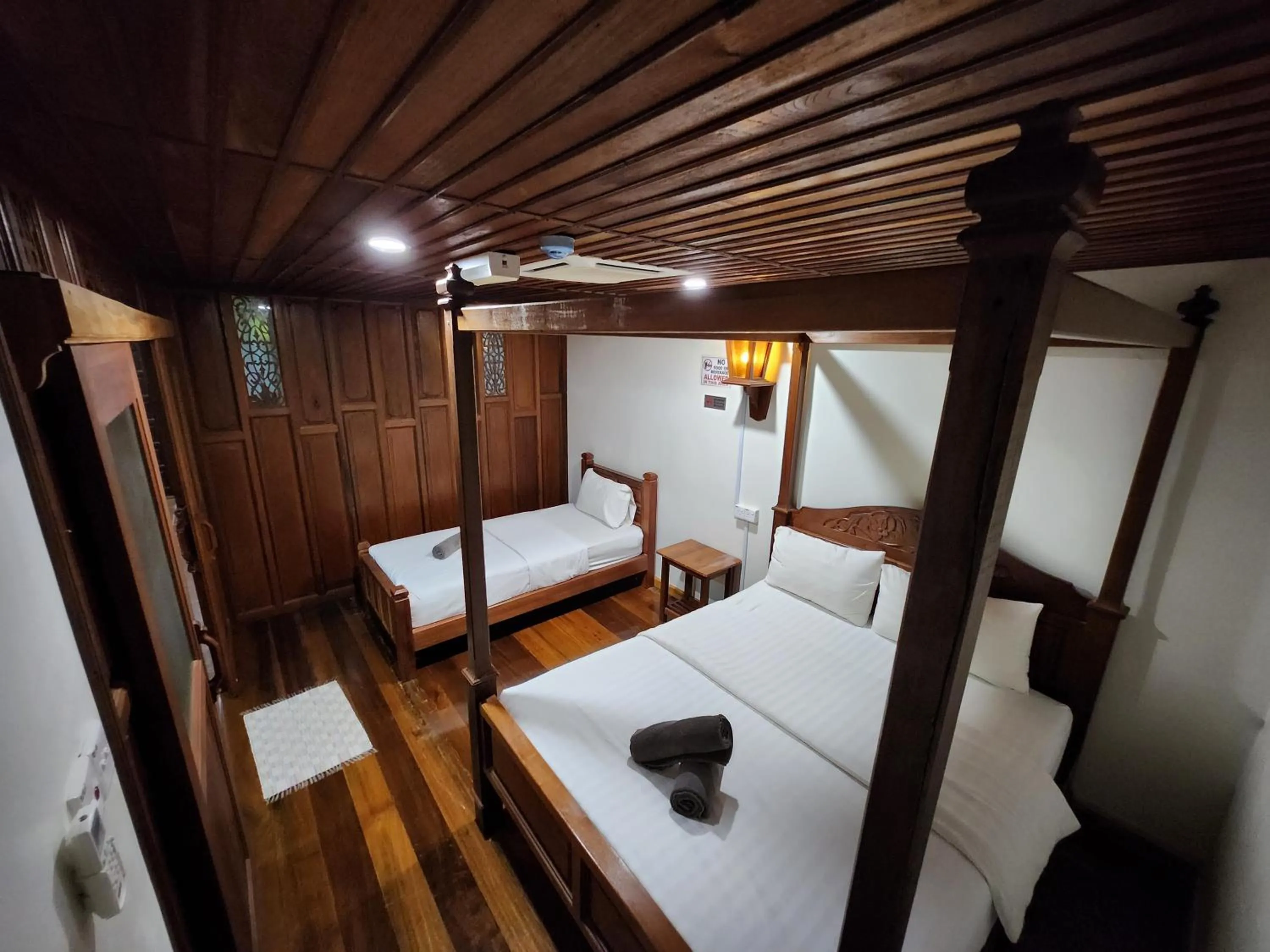 Bed in Uptown Eco Hotel