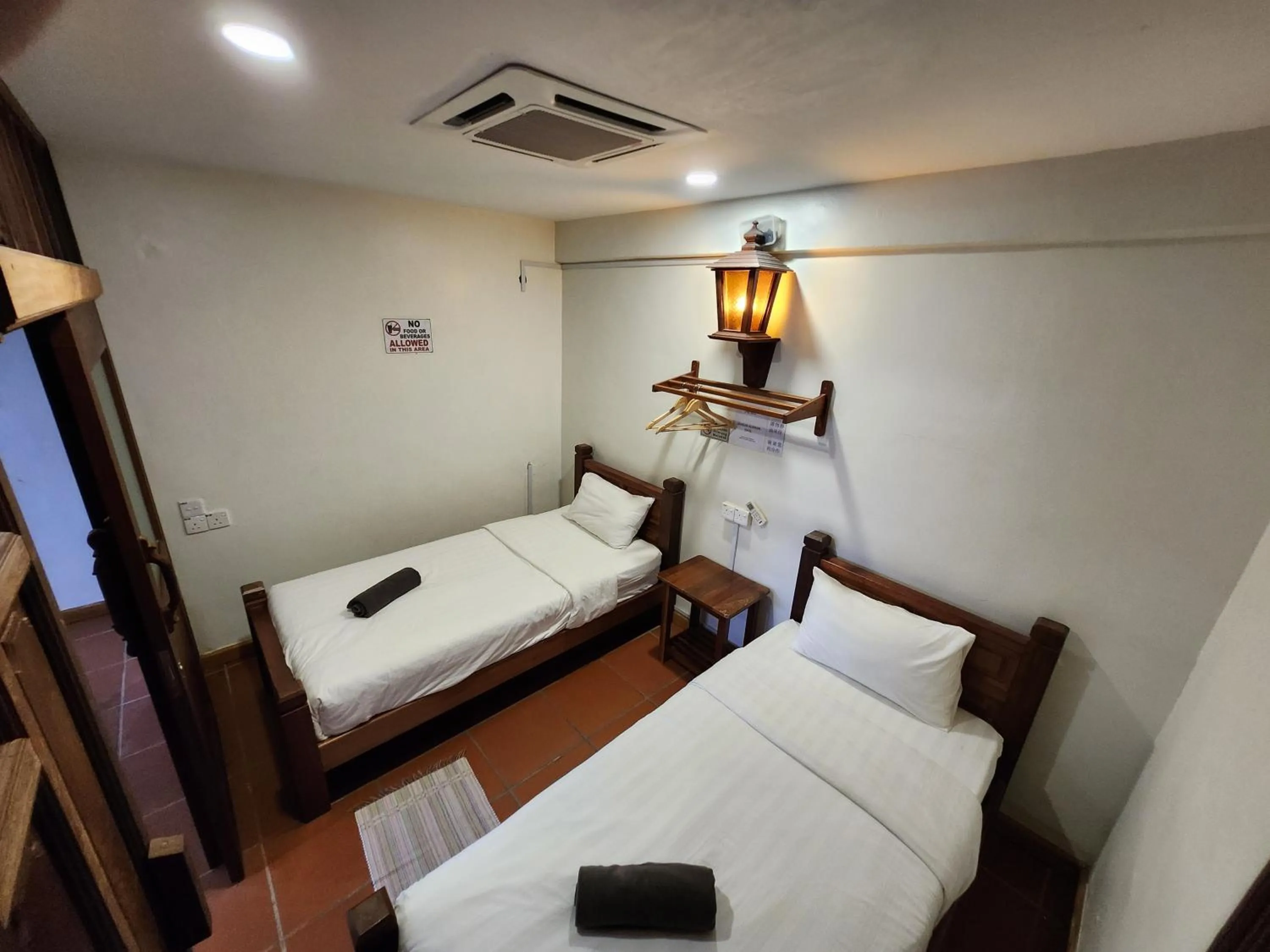 Bed in Uptown Eco Hotel