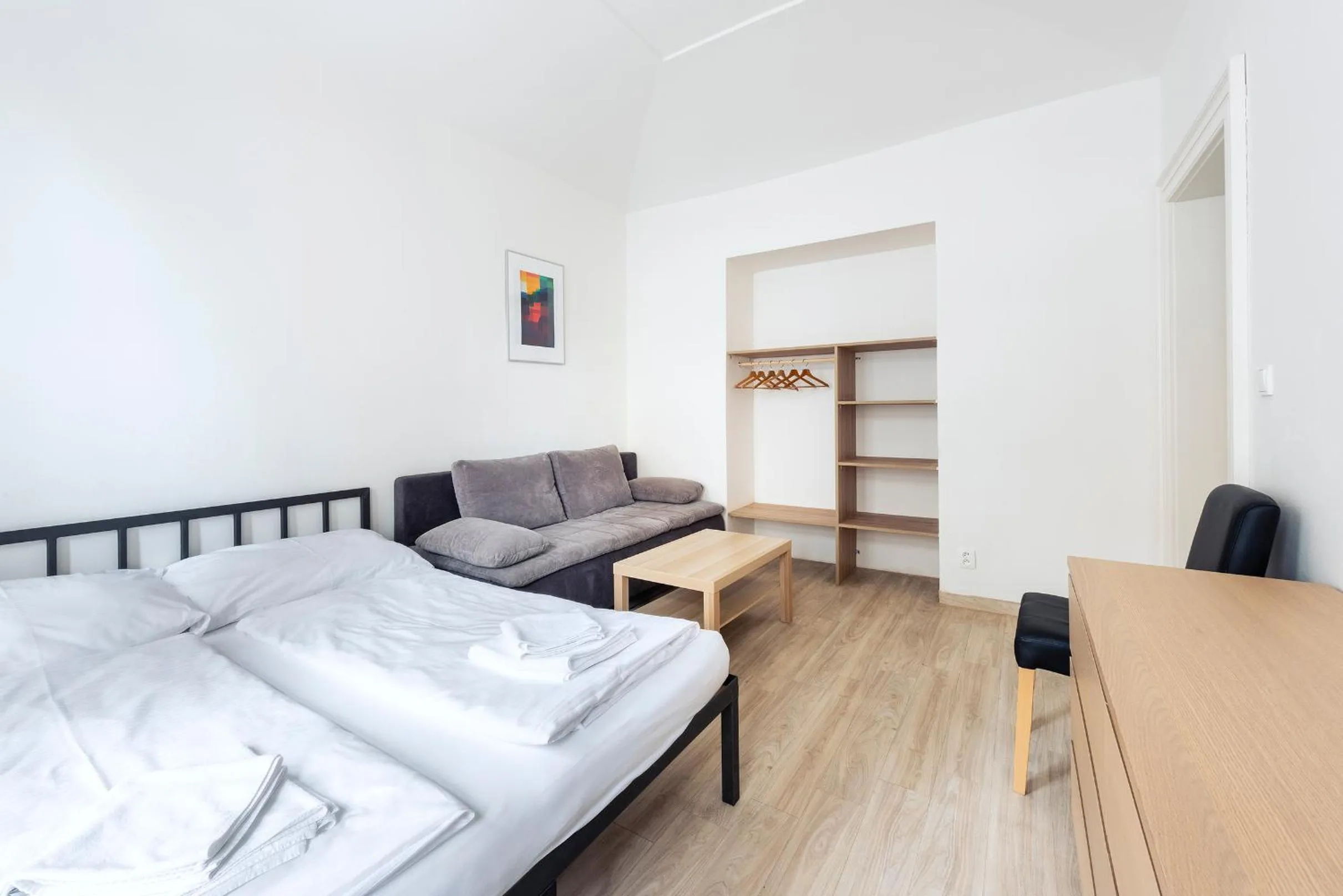 Living room, Bed in Family Apartments Praha 6