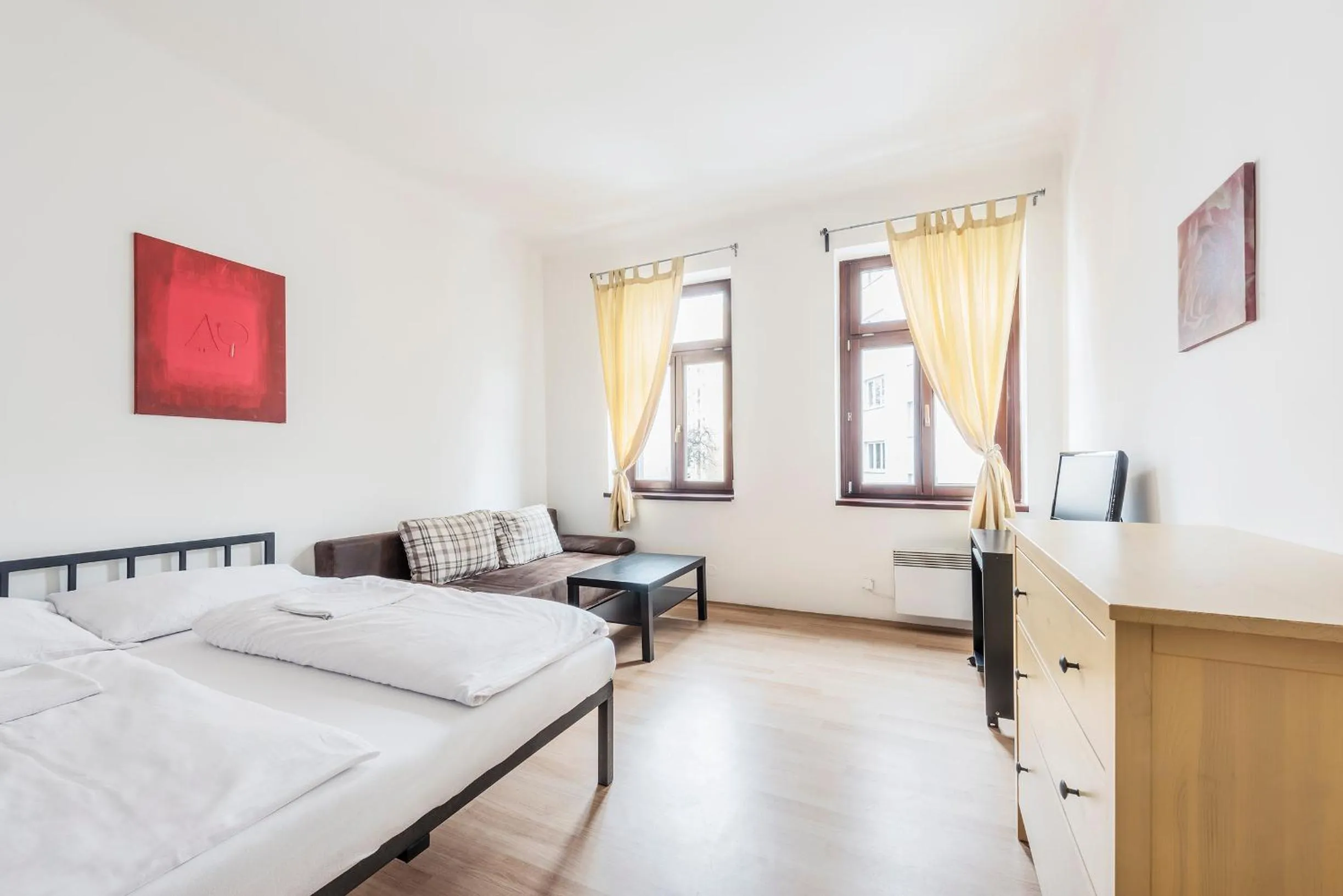 Living room, Bed in Family Apartments Praha 6