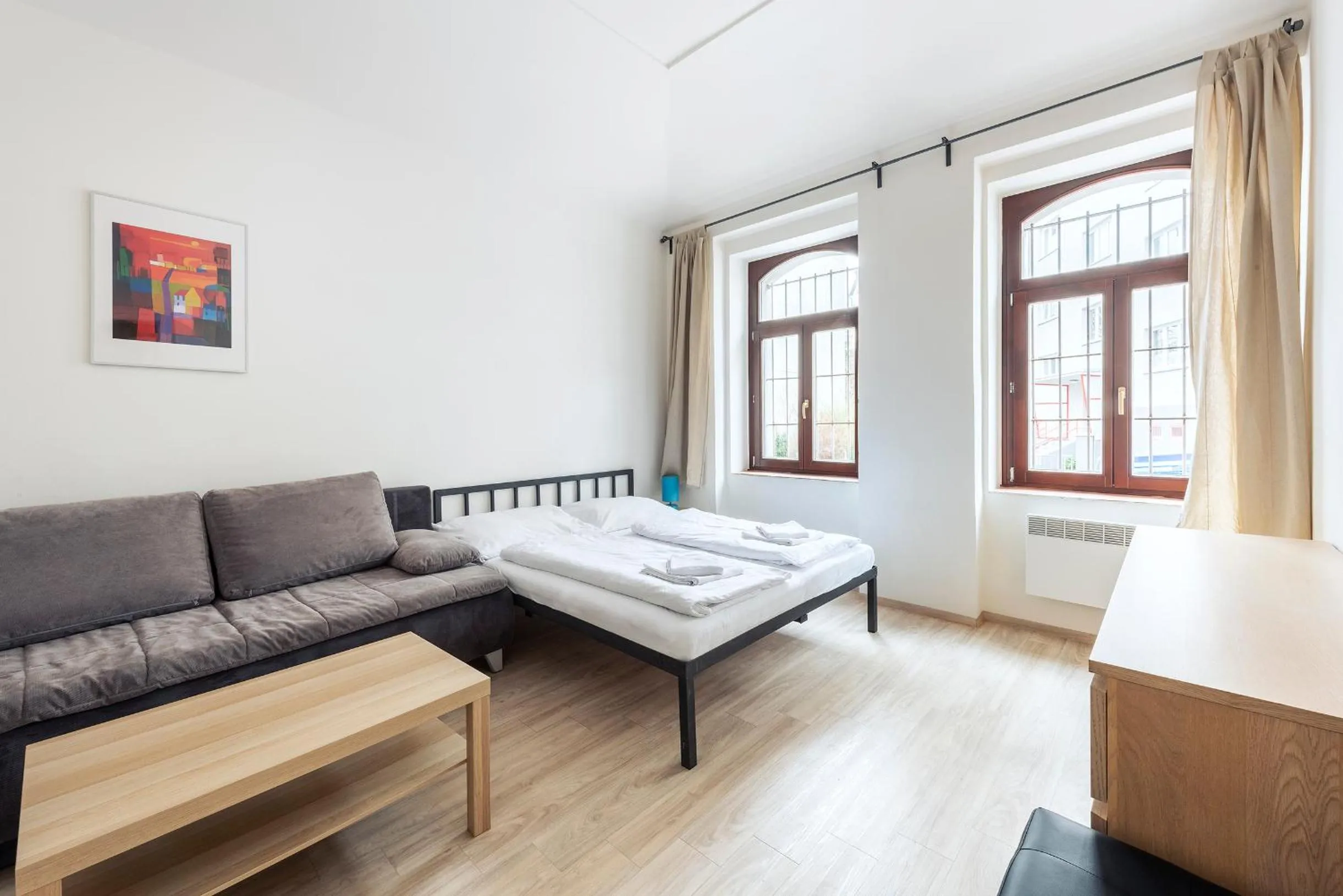 Living room, Bed in Family Apartments Praha 6