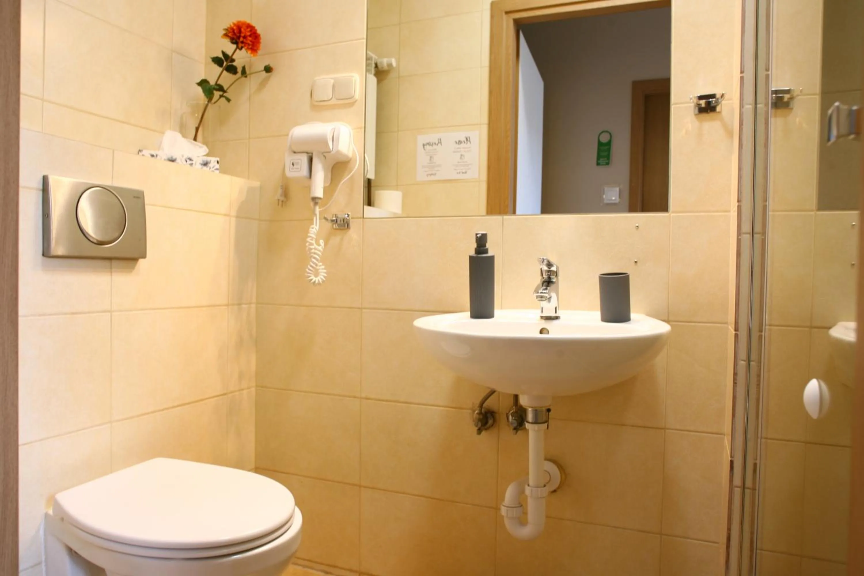 Bathroom in Miodosytnia Aparthotel