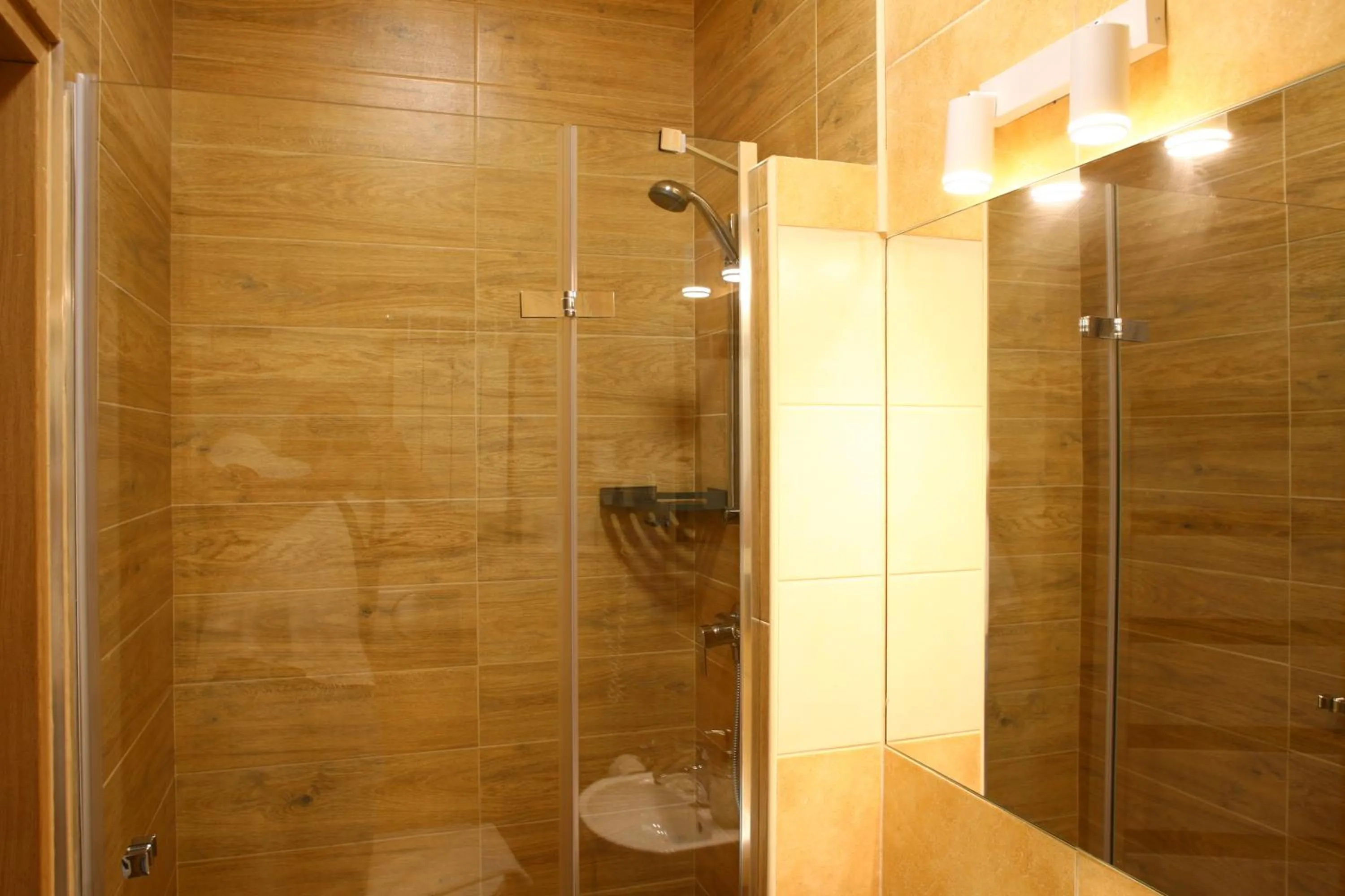 Bathroom in Miodosytnia Aparthotel