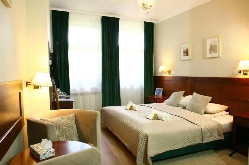 Bed in Miodosytnia Aparthotel