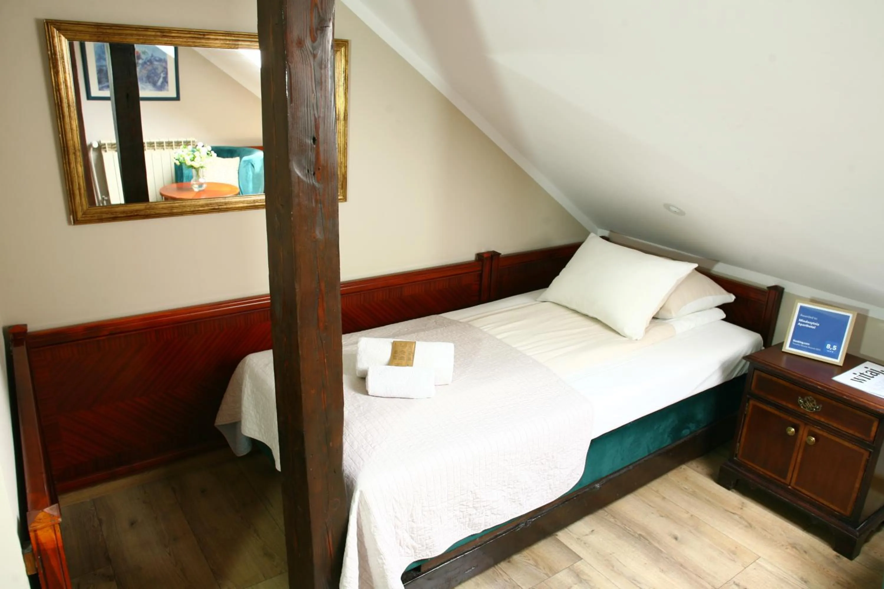Bed in Miodosytnia Aparthotel