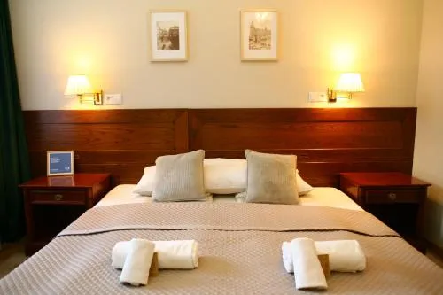 Bed in Miodosytnia Aparthotel