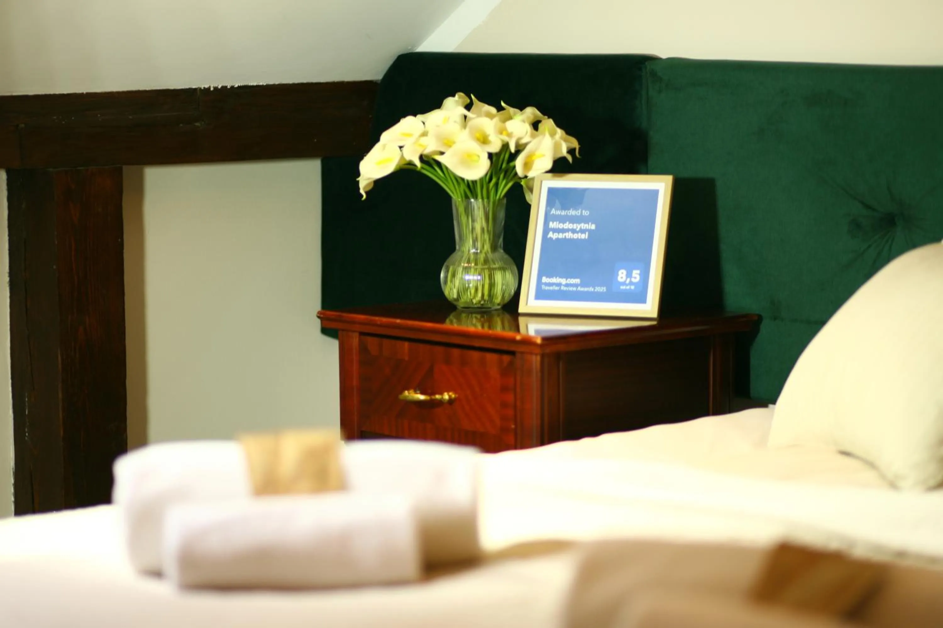 Bed in Miodosytnia Aparthotel