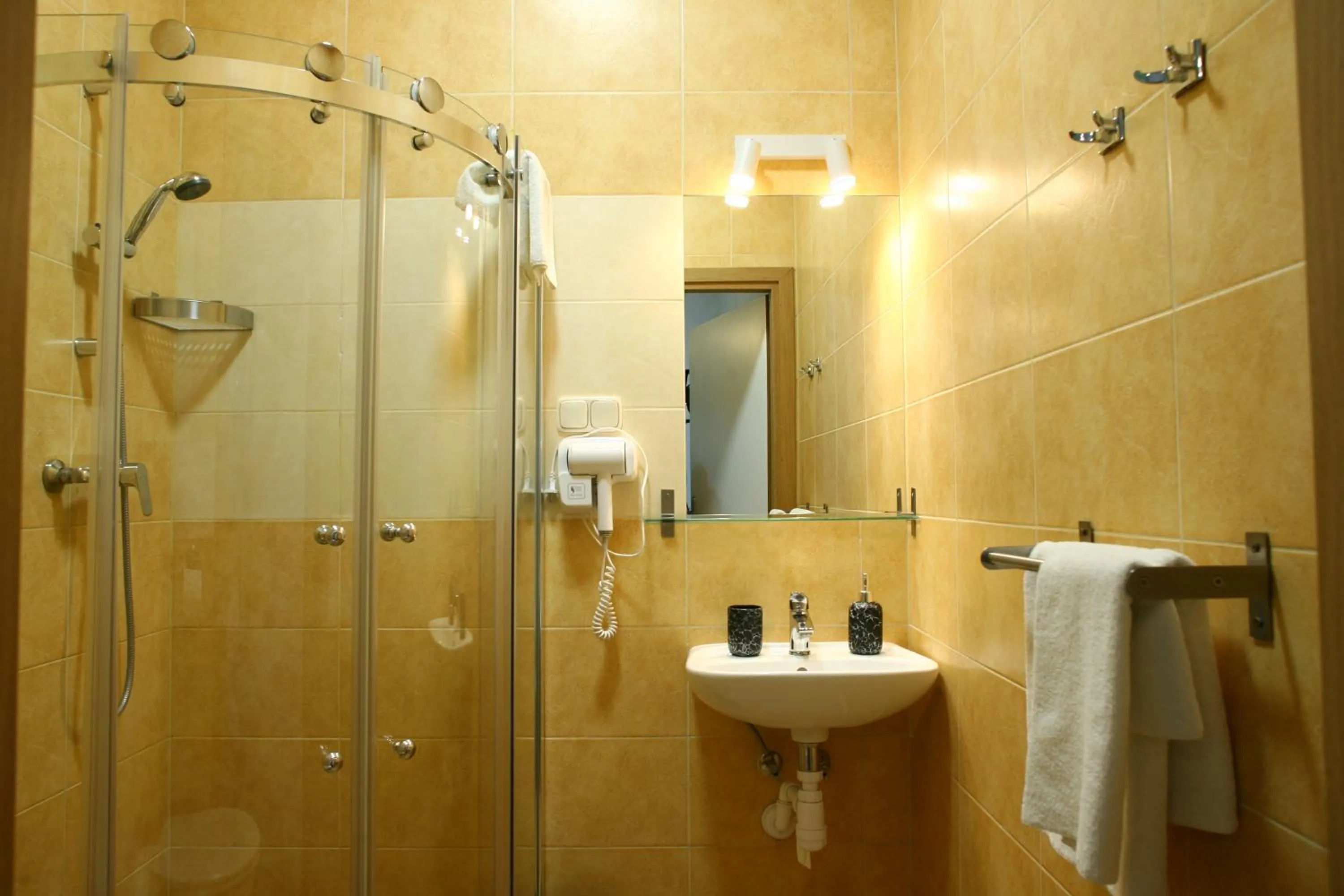 Bathroom in Miodosytnia Aparthotel