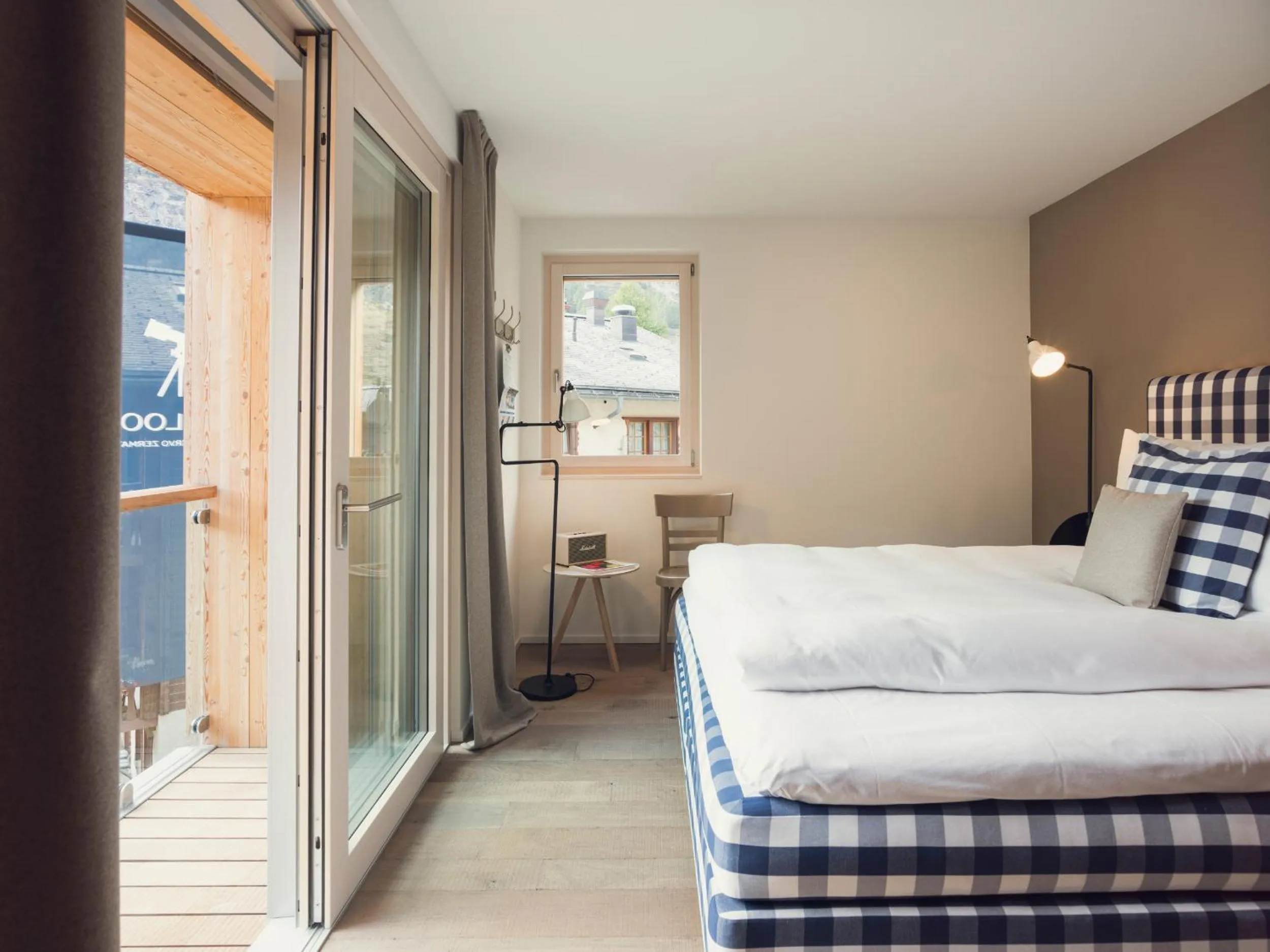 Bed in OVERLOOK Lodge by CERVO Zermatt