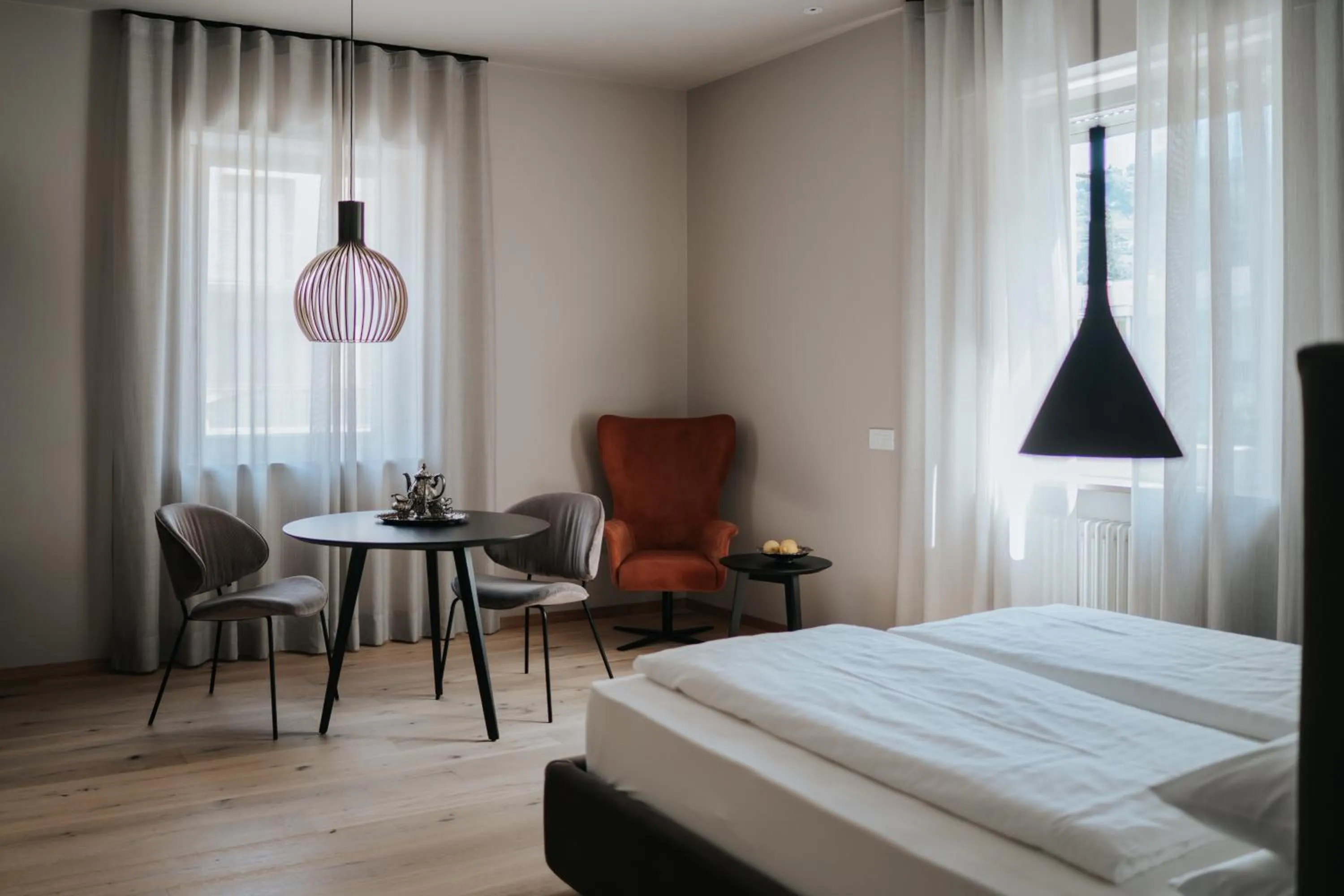 Bed in Windsor Merano Hotel & Suites