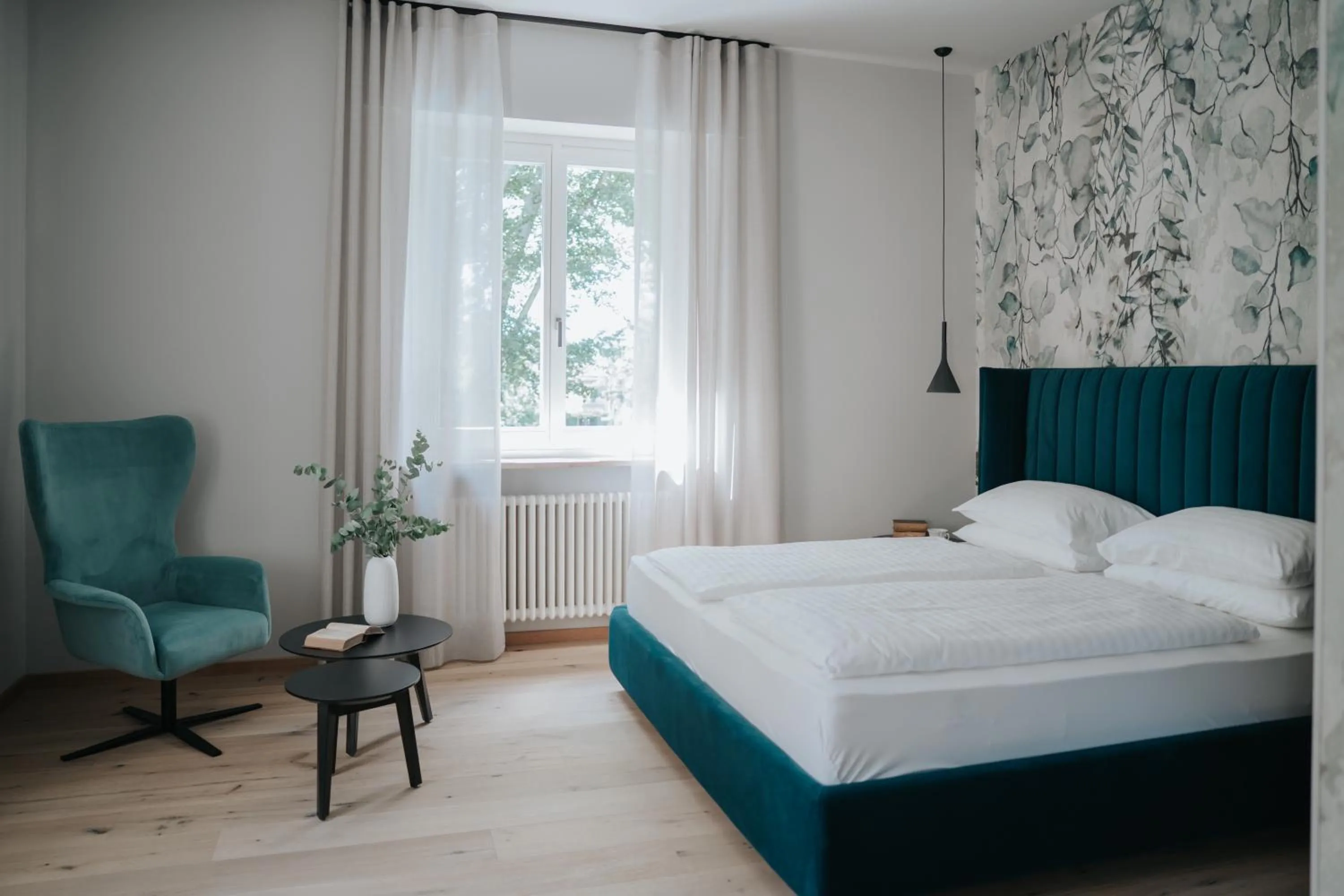 Bed in Windsor Merano Hotel & Suites