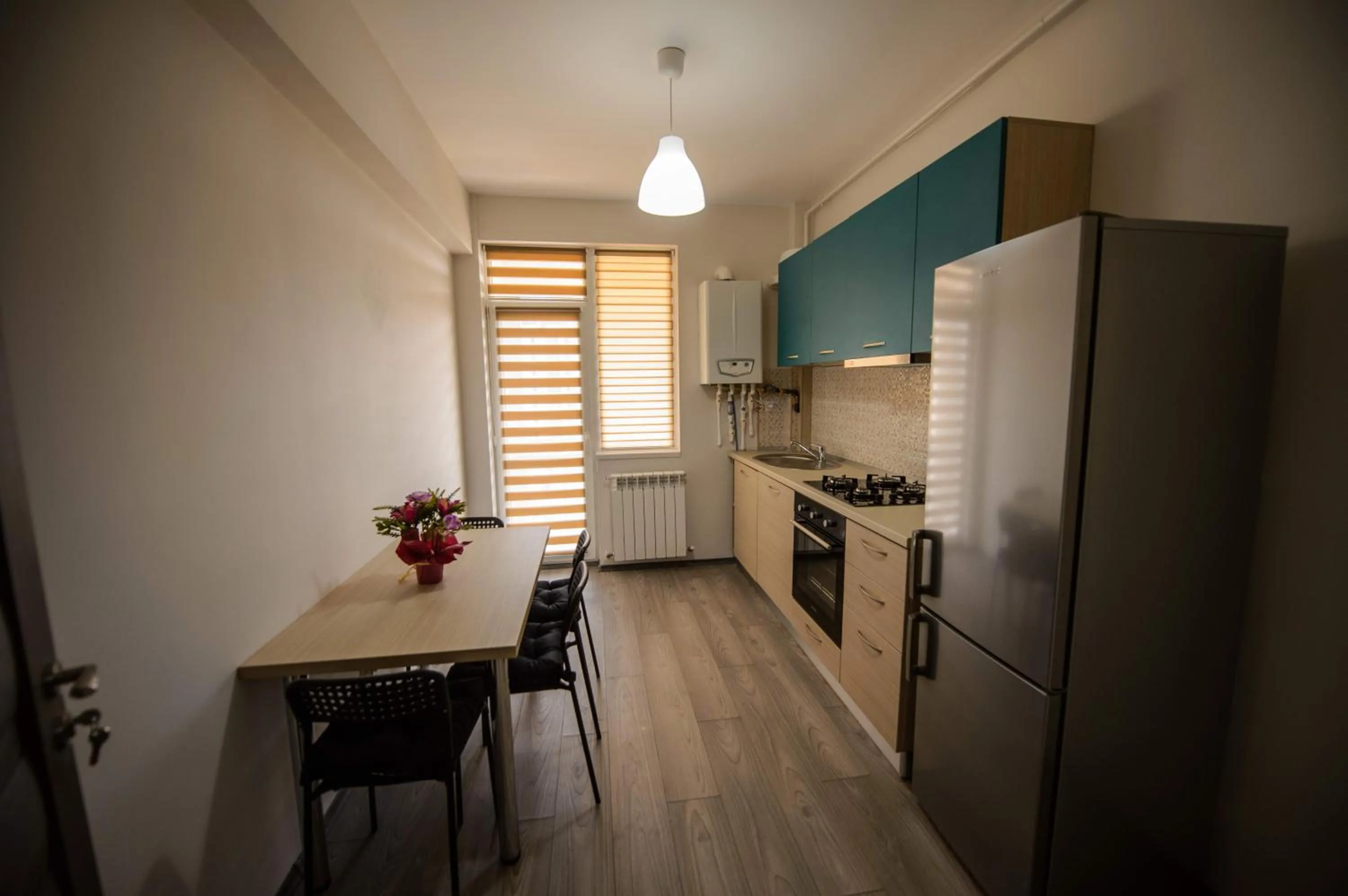 Kitchen or kitchenette in Magnum Residence