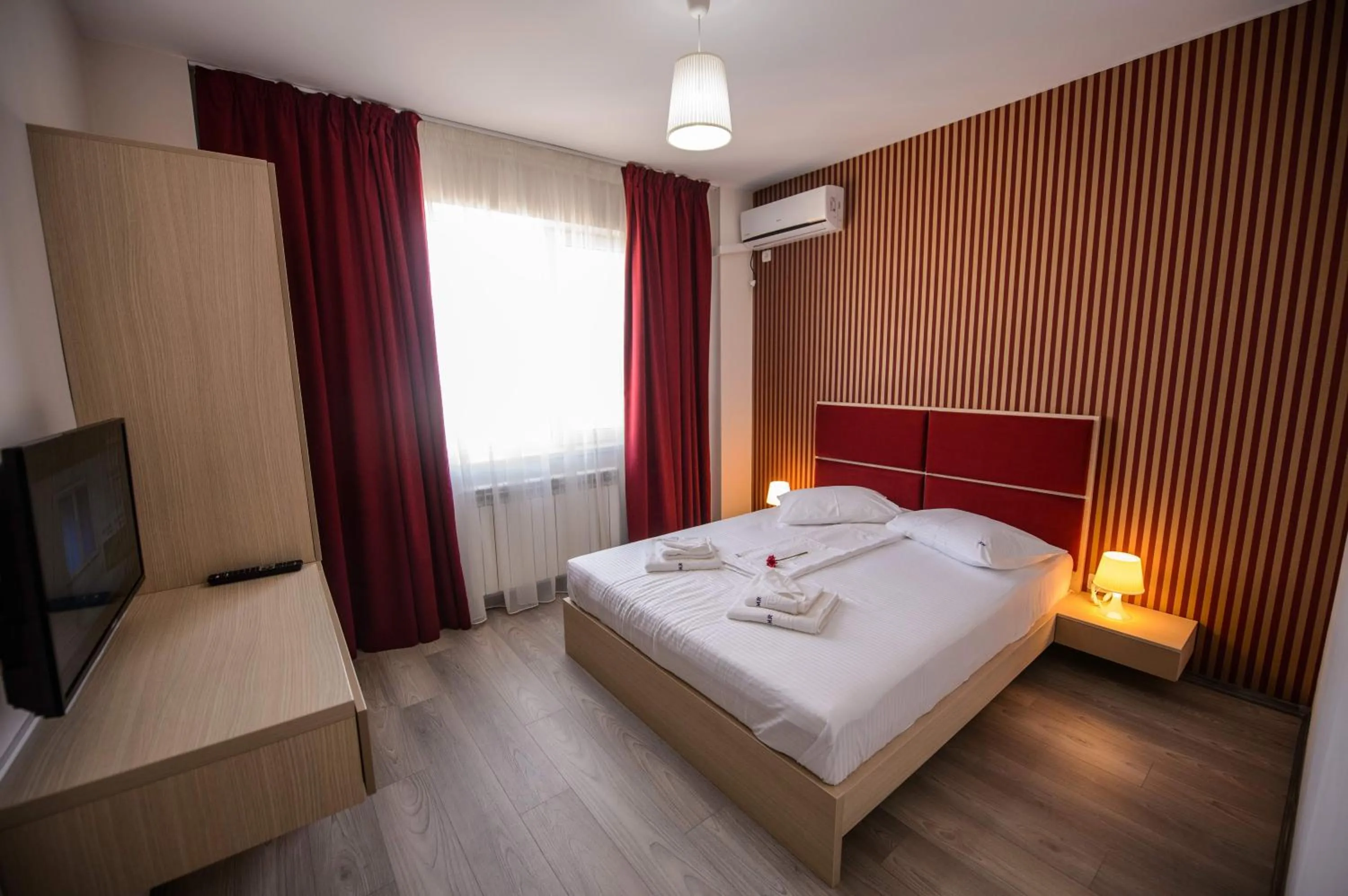 Photo of the whole room, Bed in Magnum Residence