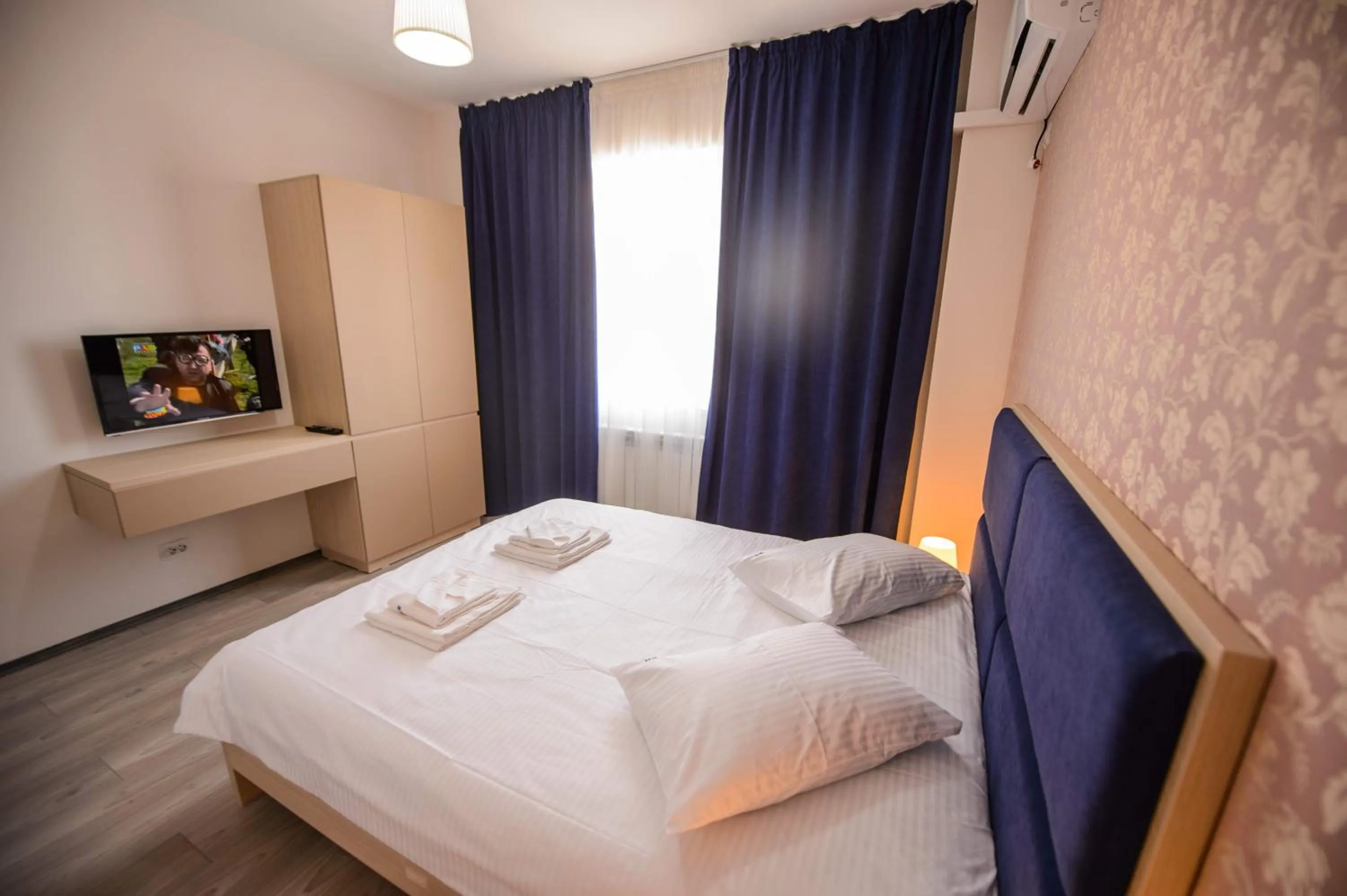 Photo of the whole room, Bed in Magnum Residence