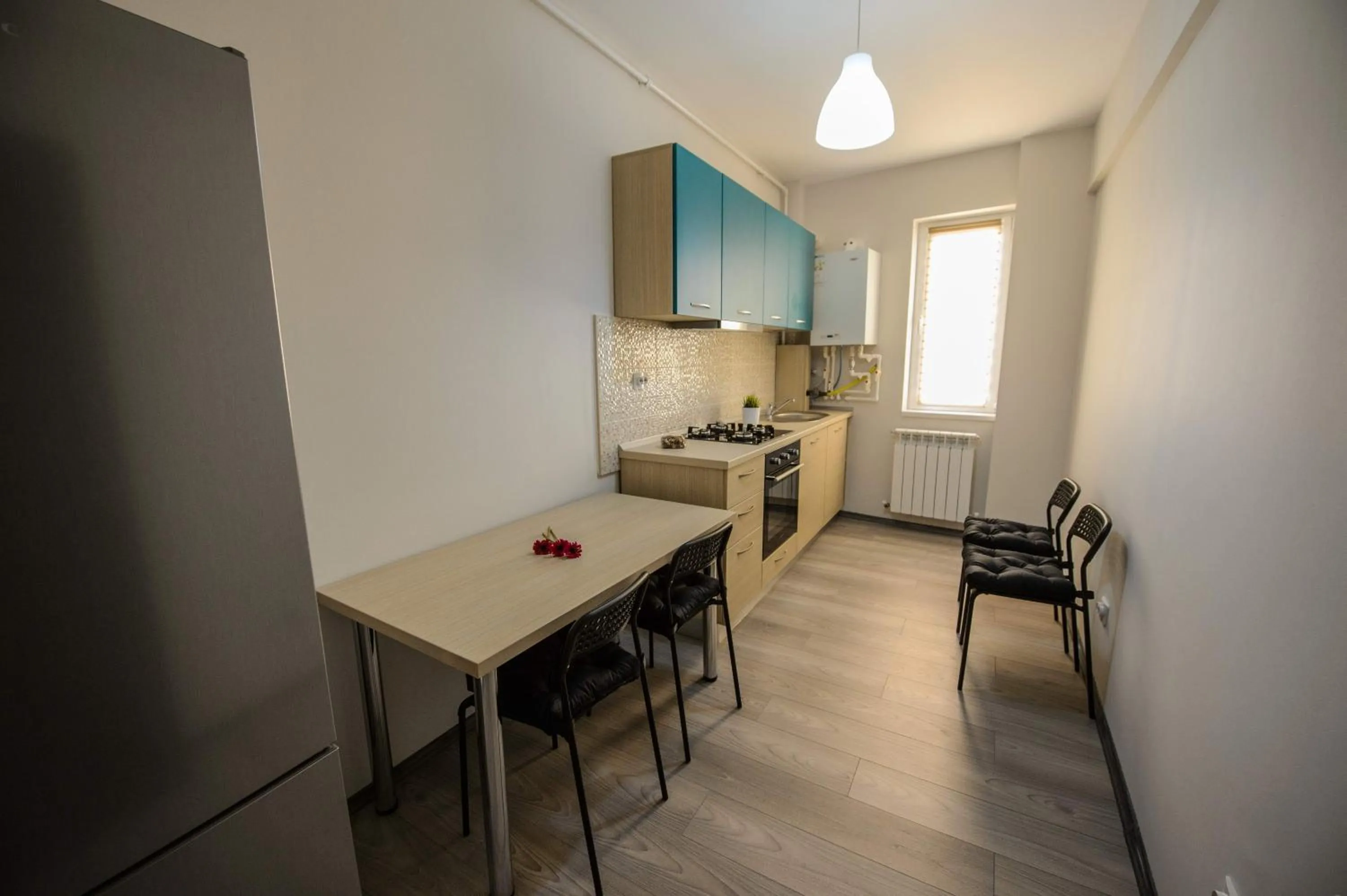 Kitchen or kitchenette in Magnum Residence