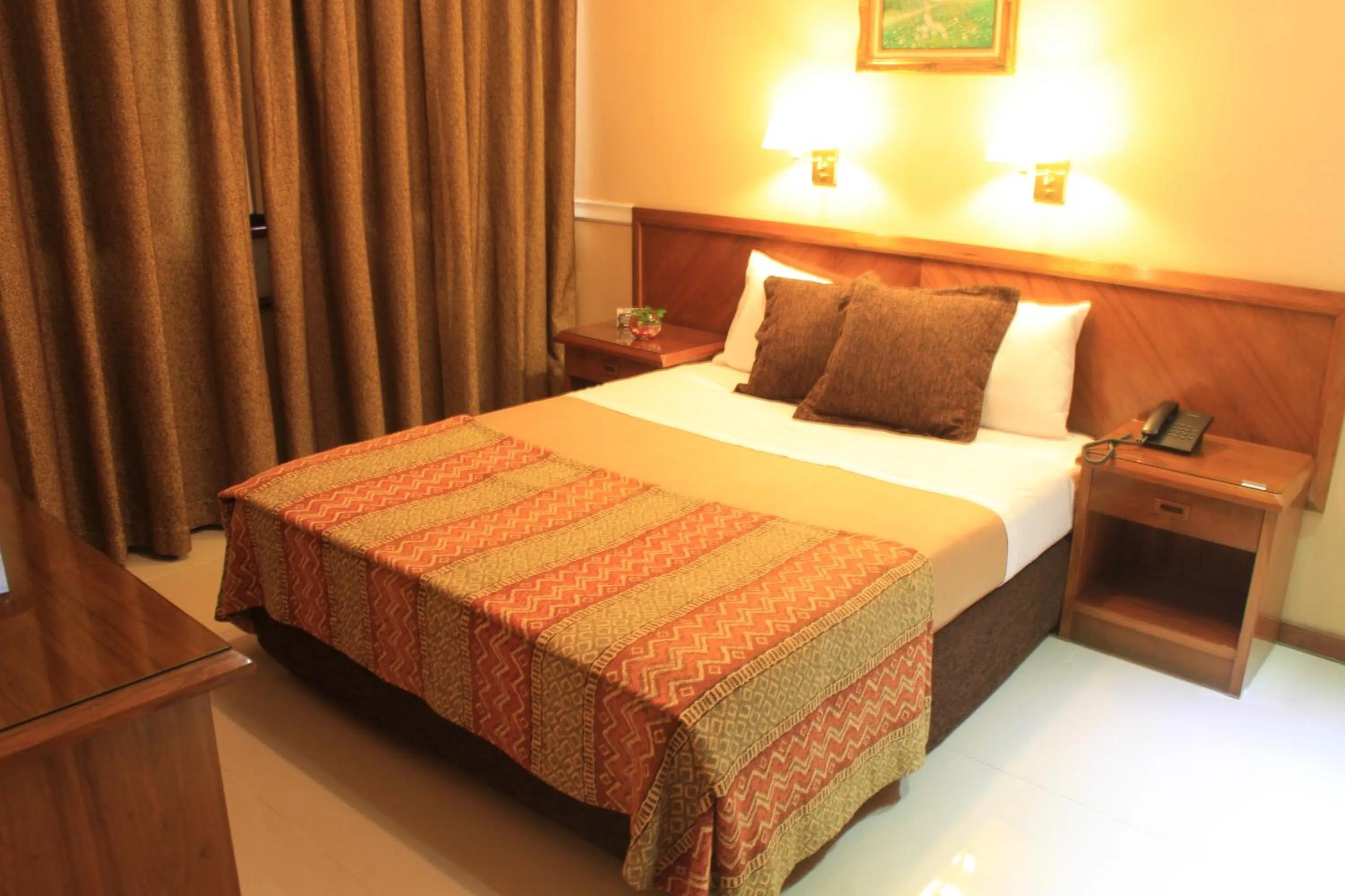 Photo of the whole room, Bed in Premier Hill Suites Hotel