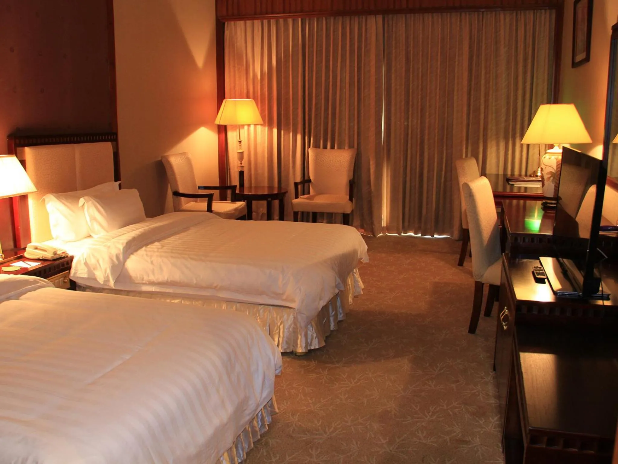 Photo of the whole room, Bed in Don Chan Palace Hotel & Convention
