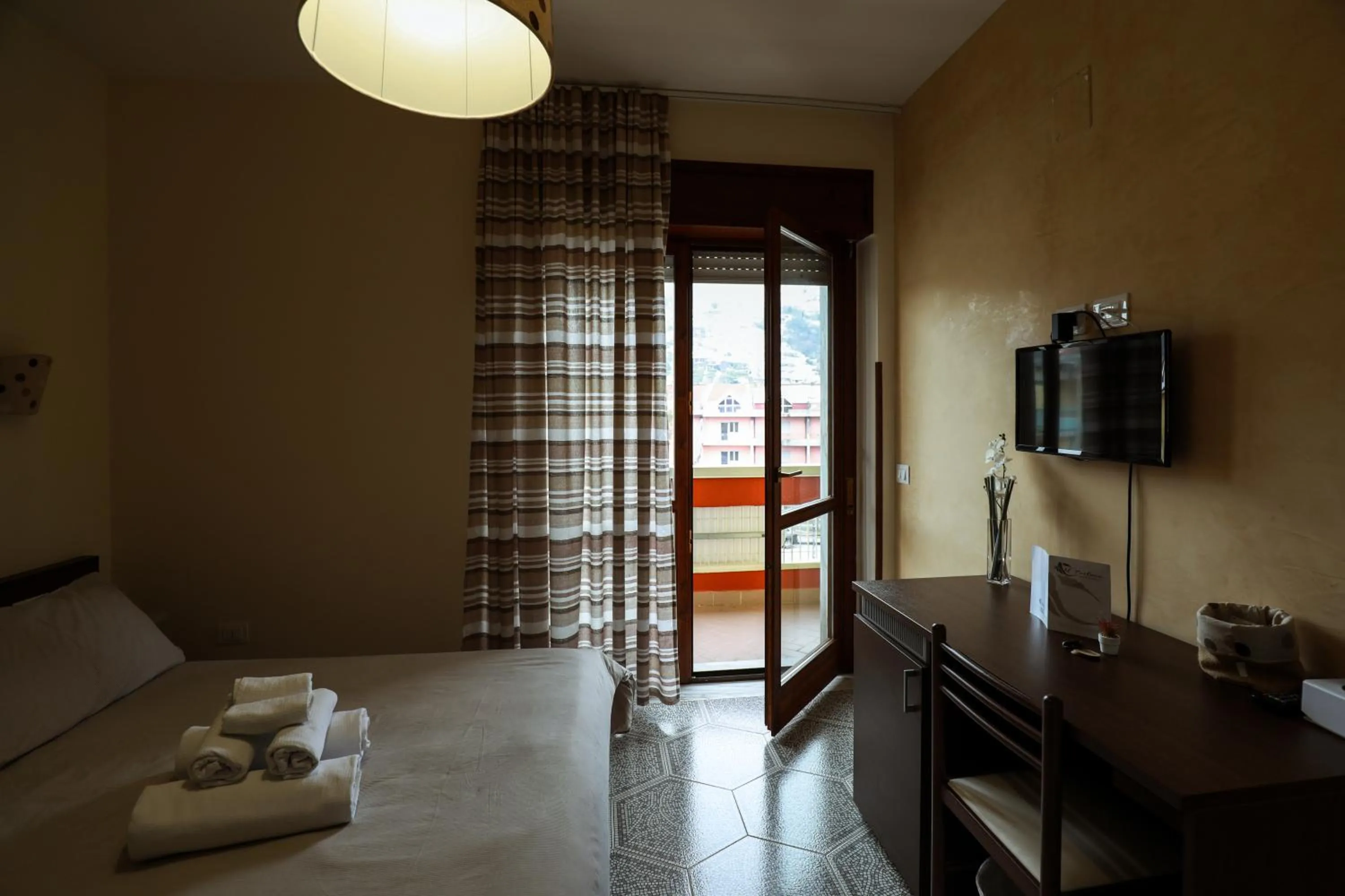 Photo of the whole room in B&B Il Tritone