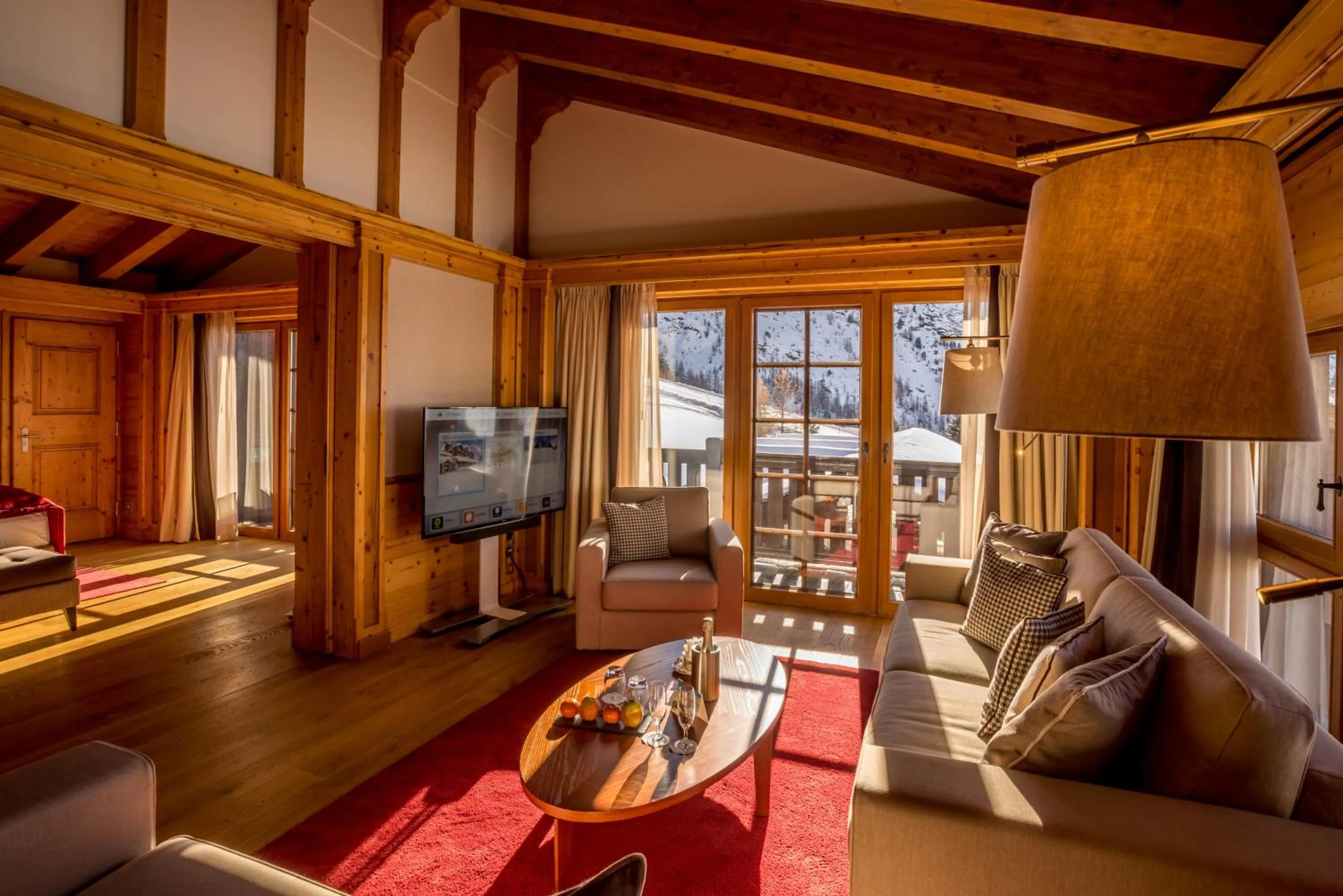 Communal lounge/ TV room in Riffelalp Resort 2222m Ski-in & Ski-out